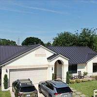 24ga 1.5" Mechanical Seam Dark Bronze by Total Roofing System The Metal Roof Experts