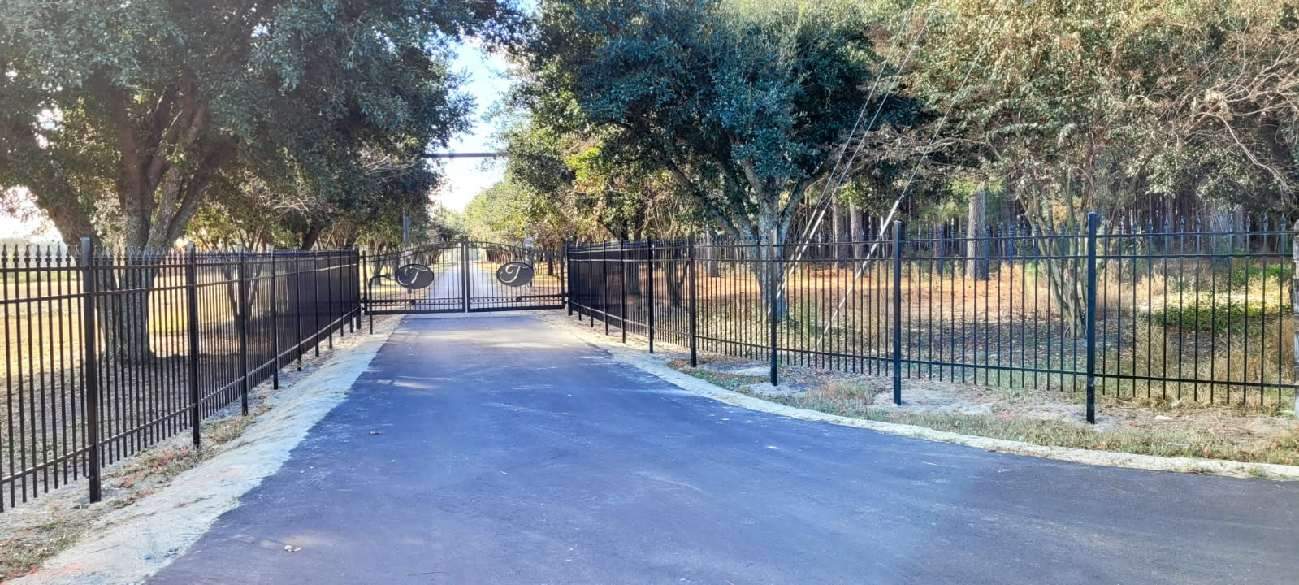 Custom Aluminum Gates with Automation by Superior Fence and Rail