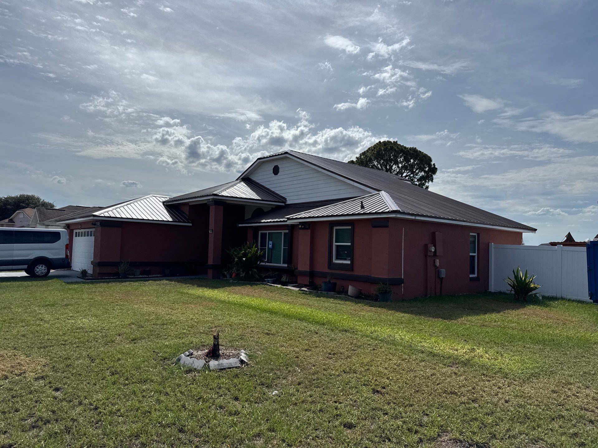 Residential Metal Roofing Installation and Gutter Replacement in Kissimmee by Pinnacle Roofing Group