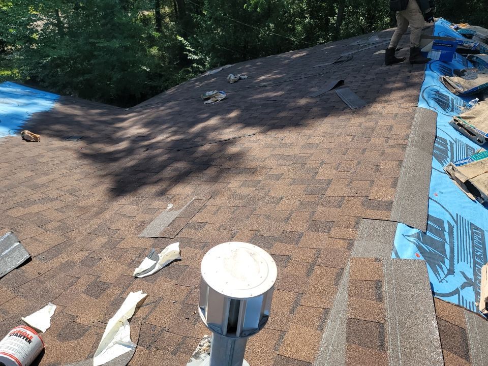 Residential Roofing Repair using Roof Replacement by American Roofing & Construction LLC