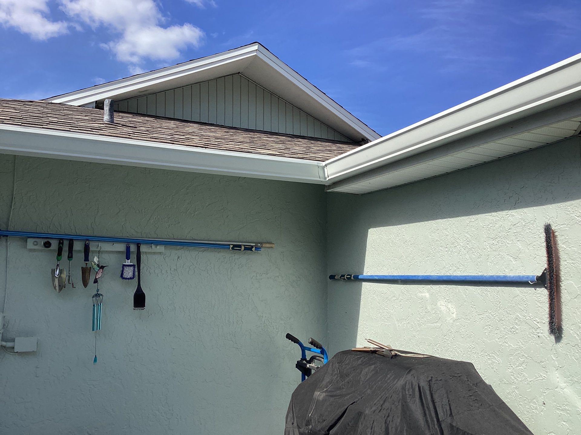 Downspout Installation using 3X4 Elbow Downspout in Cape Coral FL by Gutter Professors
