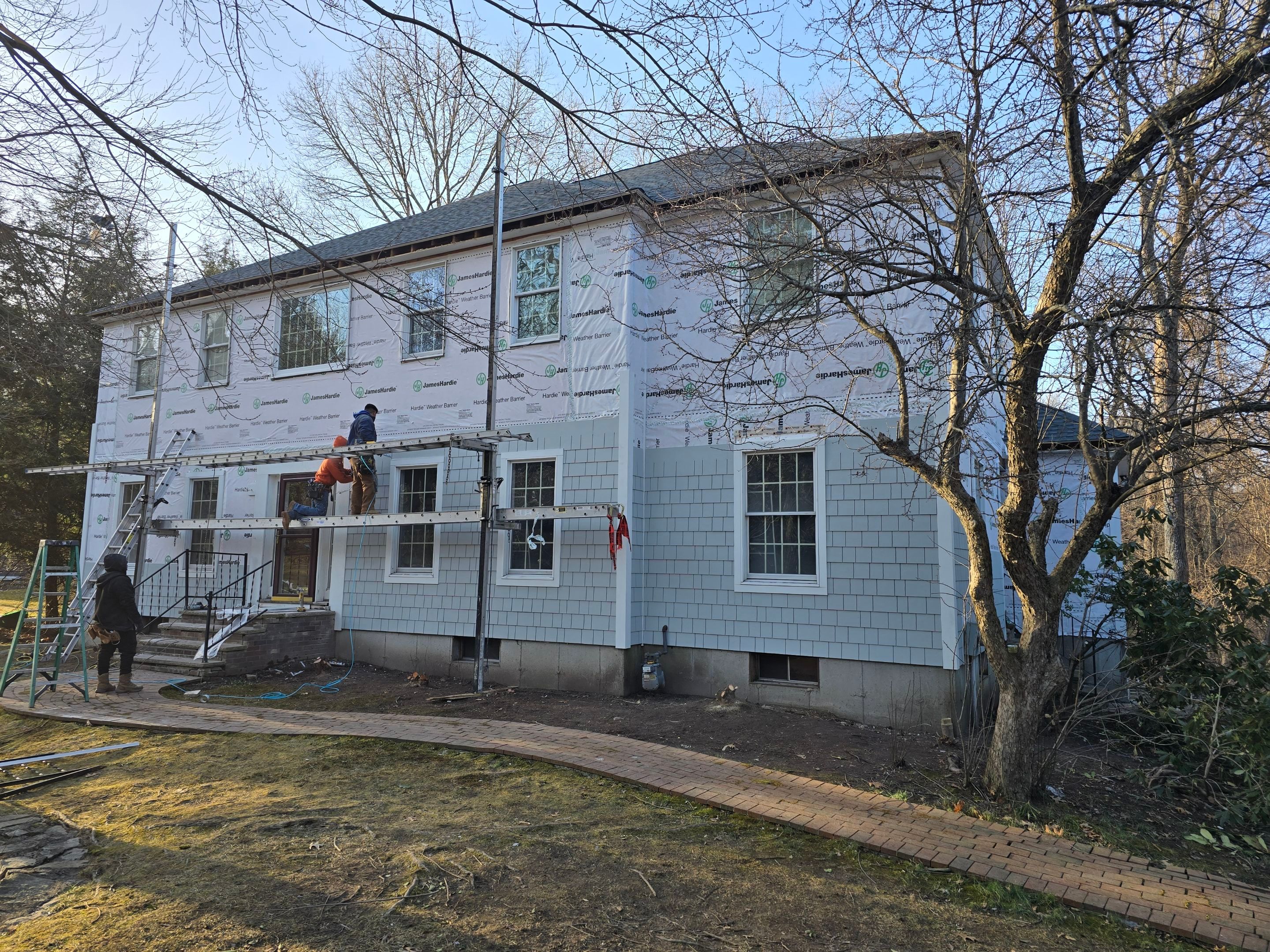 Siding and roof replacement in Framingham, Ma by UBrothers Construction
