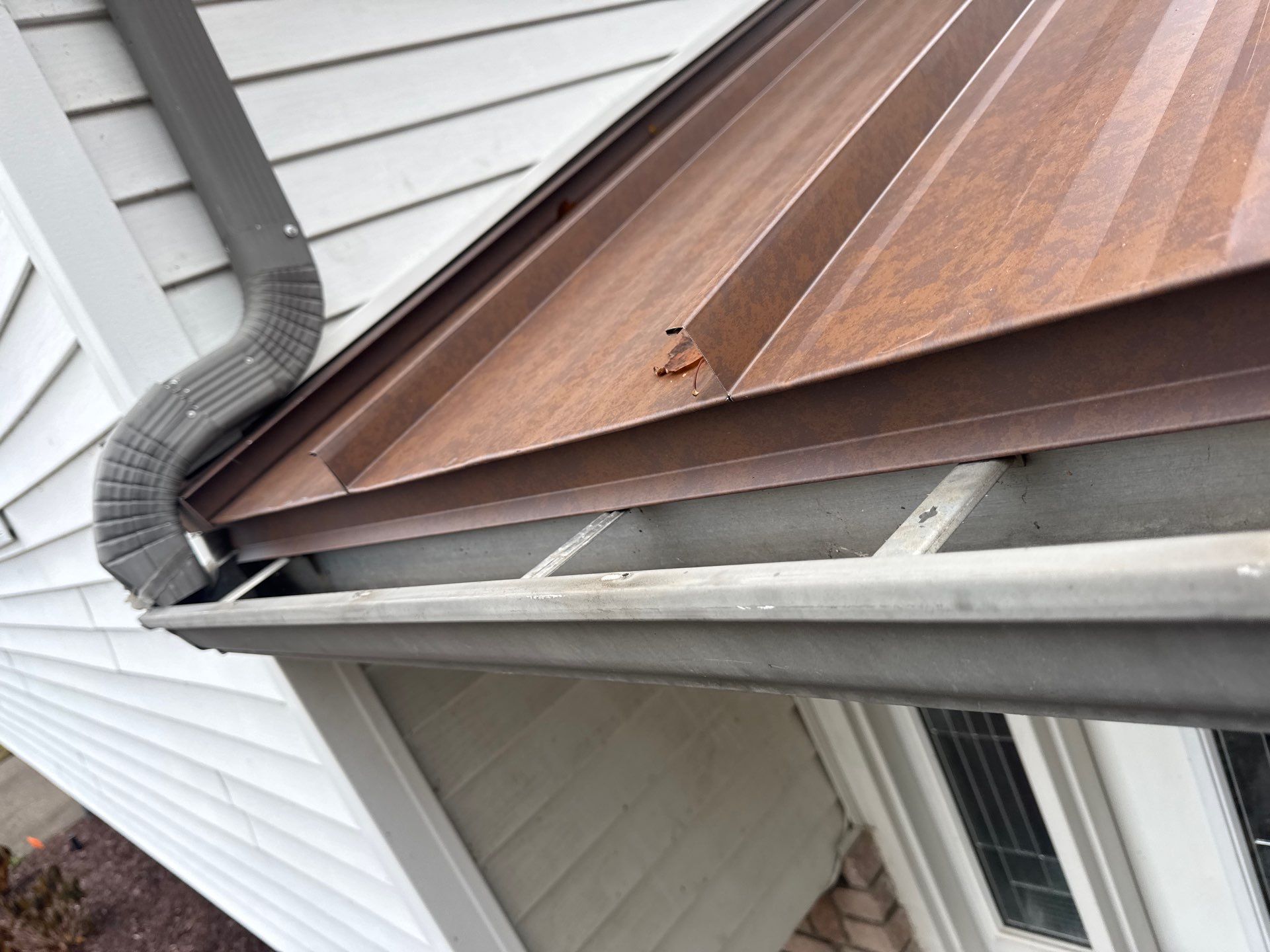 Roof Replacement using MS Standing Seam Roof Western Rust by 180 Contractors