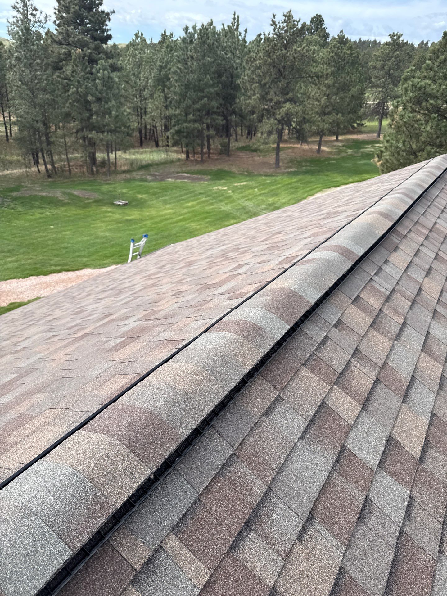 Architectural Shingle Roof and Gutter Installation in Rapid City by Weather-Tite Exteriors LLC