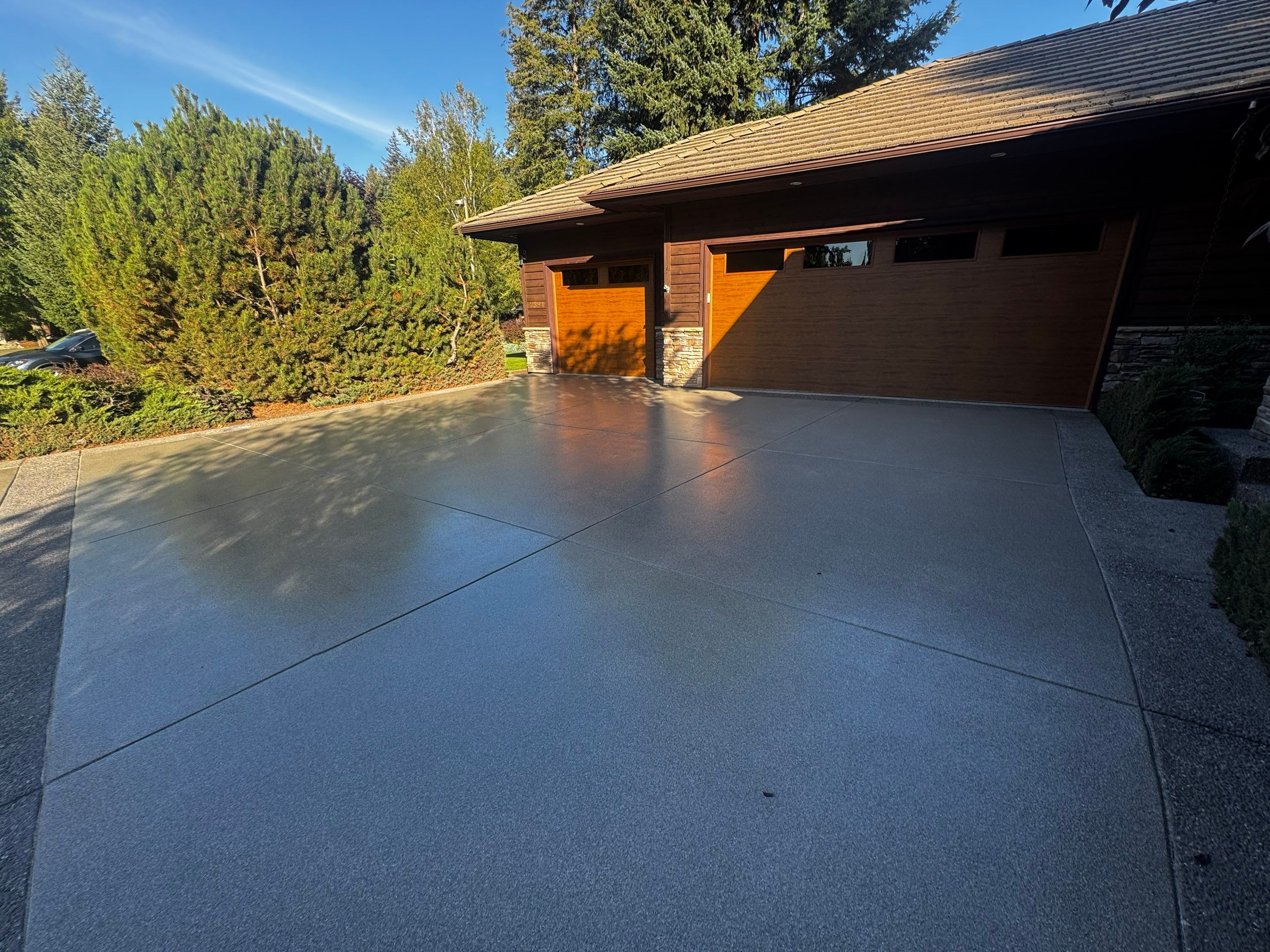 Driveway using Penntek Evolution System and Trail Mix 1/8" Chip by Croc Coatings, LLC