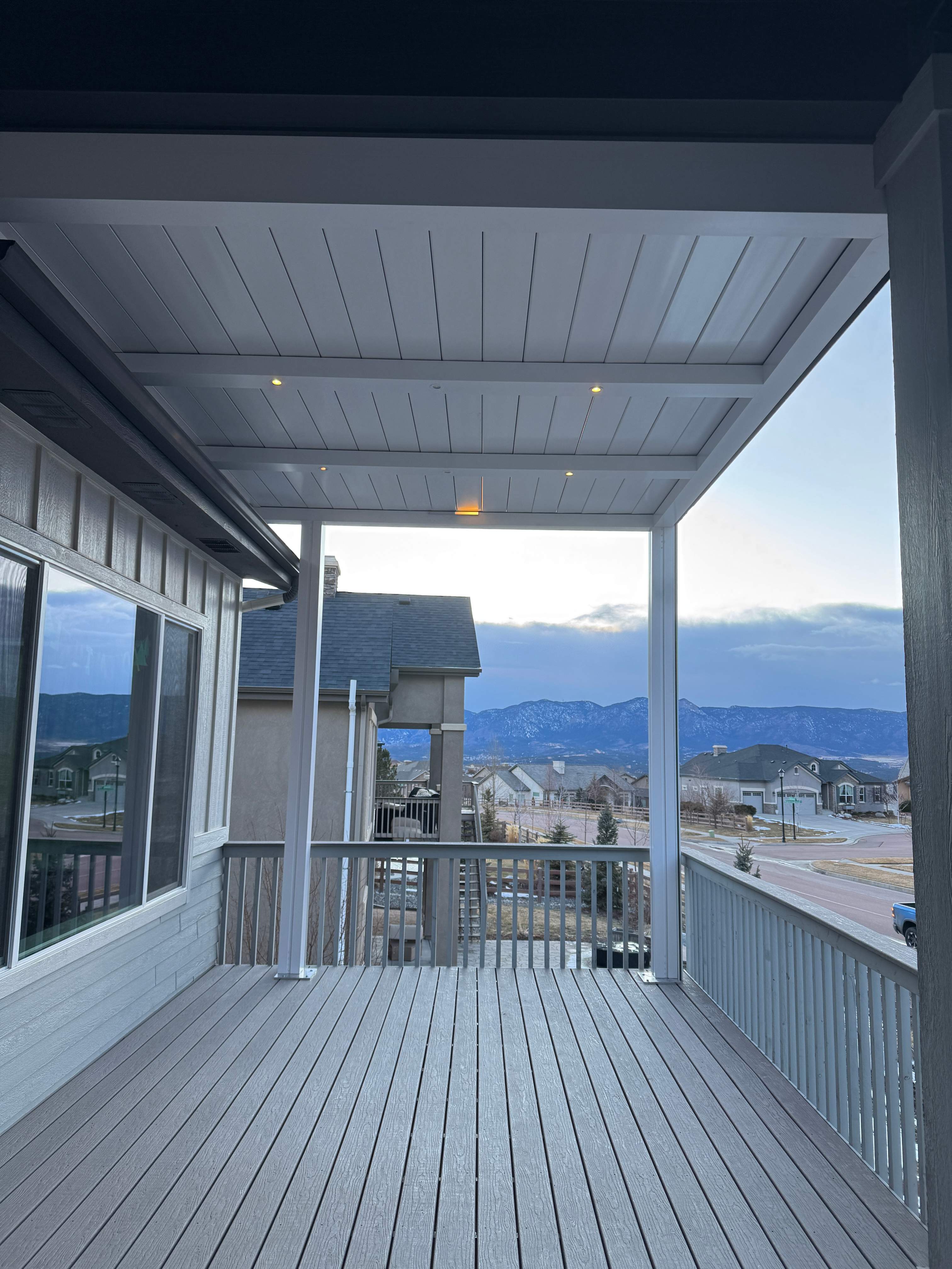 Aluminum Pergola using Azenco Outdoor with Motorized Exterior Screens by Outdoor Solutions Colorado
