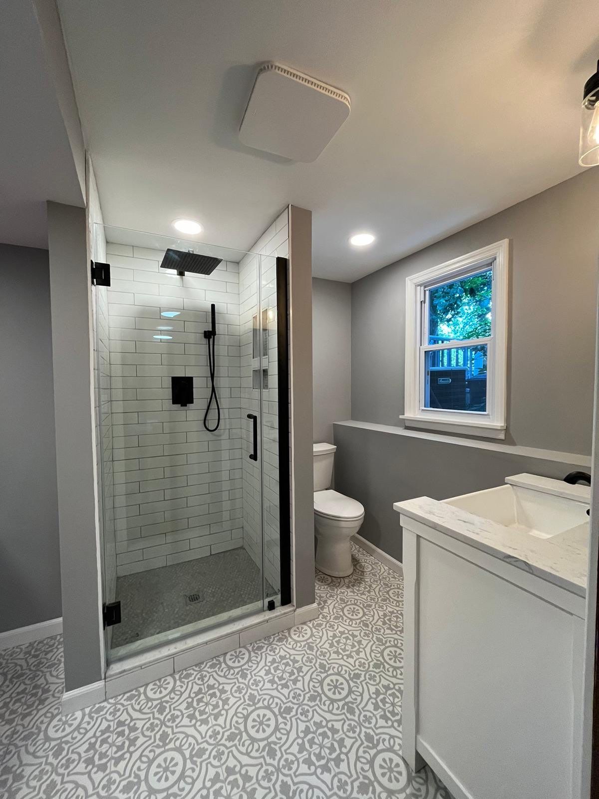 Bathroom Remodel using Tile by Home Concepts Construction