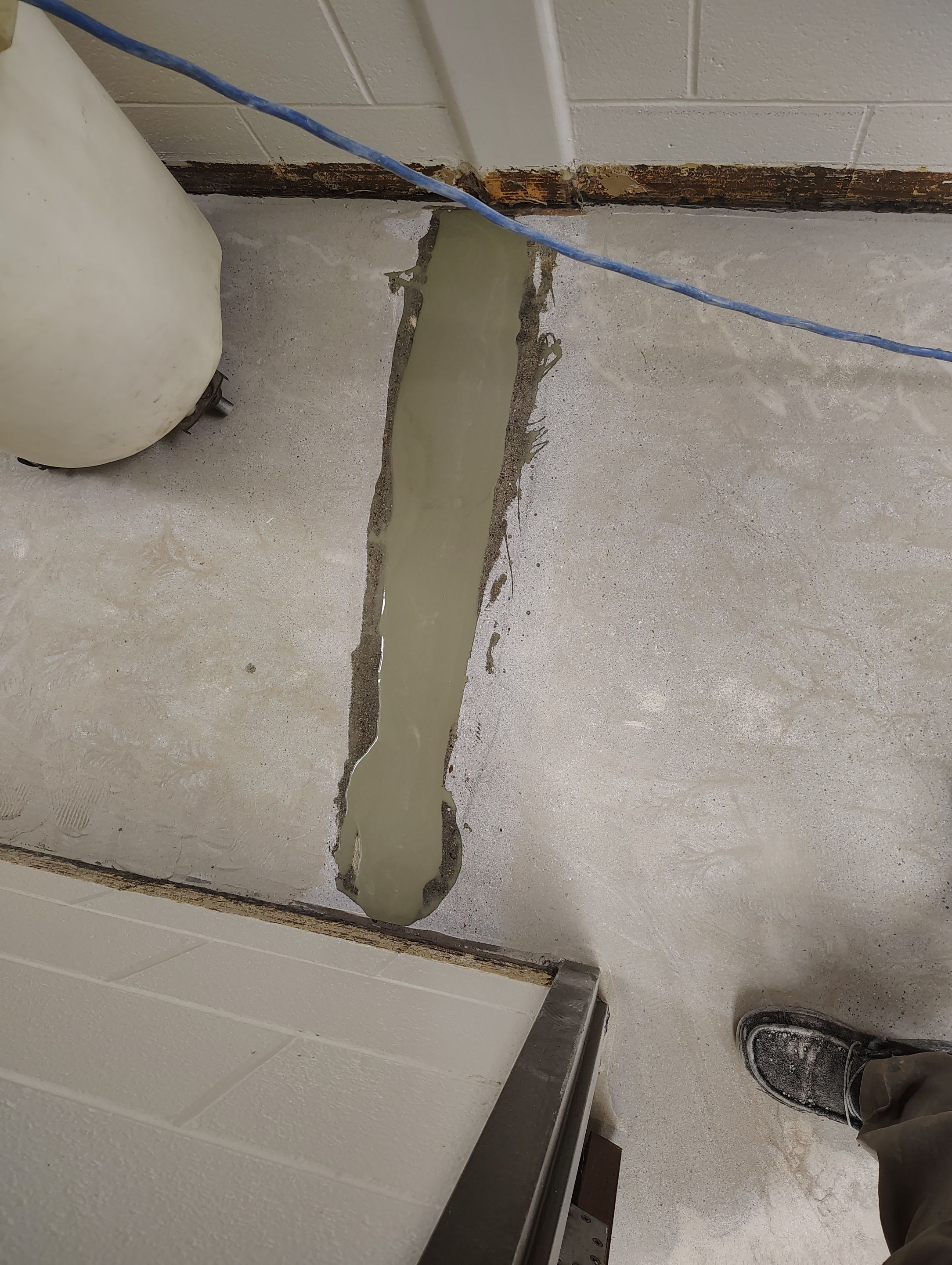 Industrial Flake Epoxy Floor Installation at Pierre National Guard Facility by Select Painting, Coatings & Garage Cabinets