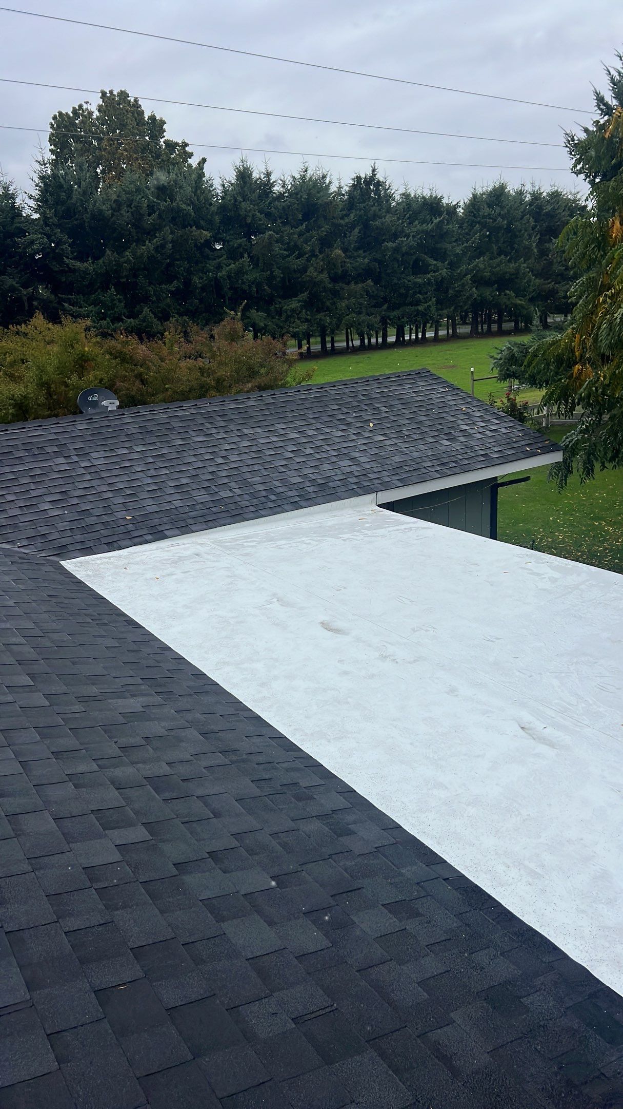 Residential Roofing Installation using IKO Dynasty (Color: Granite Black) by Orezona Building & Roofing Company, Inc.