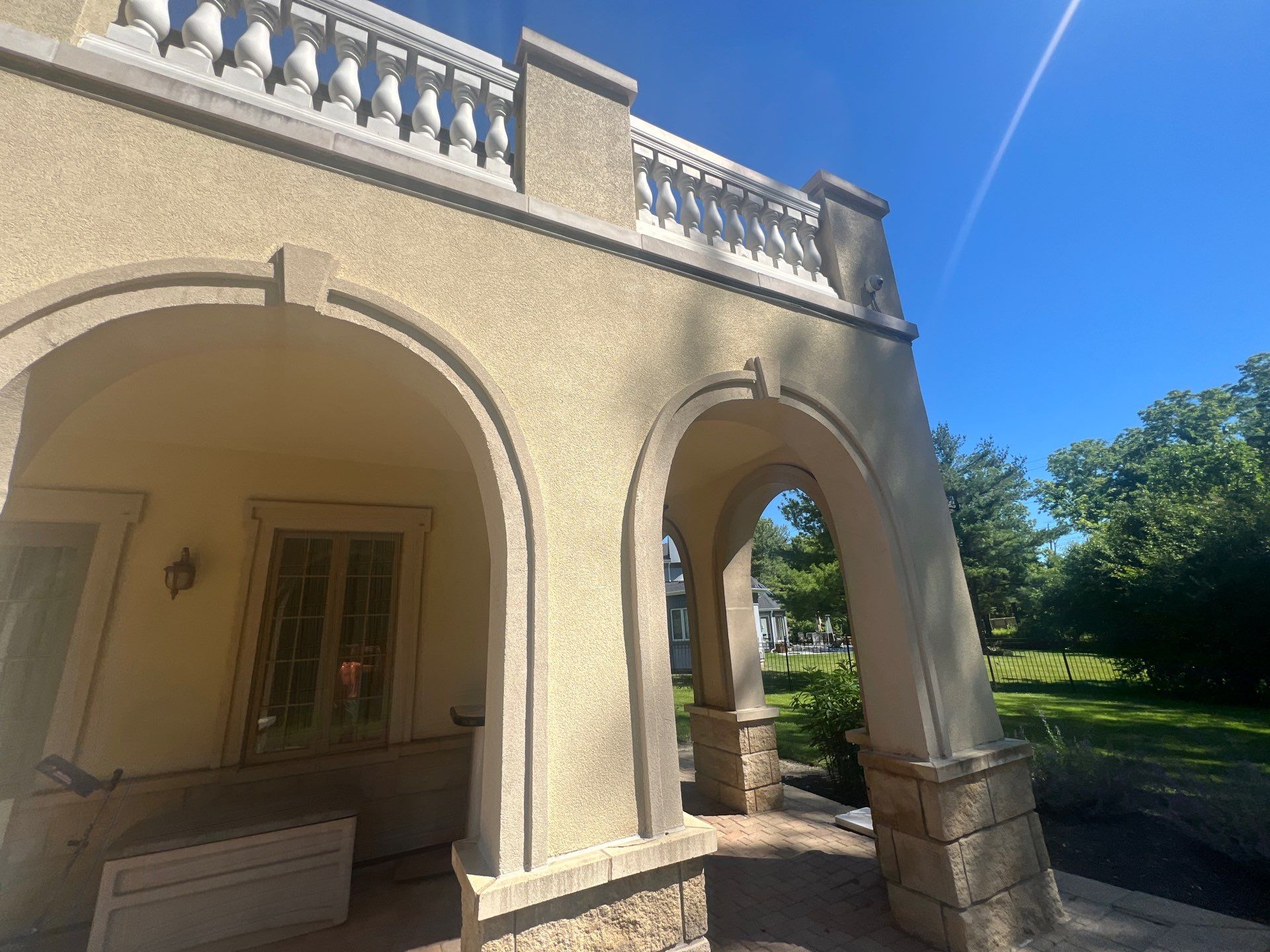 concrete cleaning using Algaecide, soft wash soap by Northern Power Washing LLC.