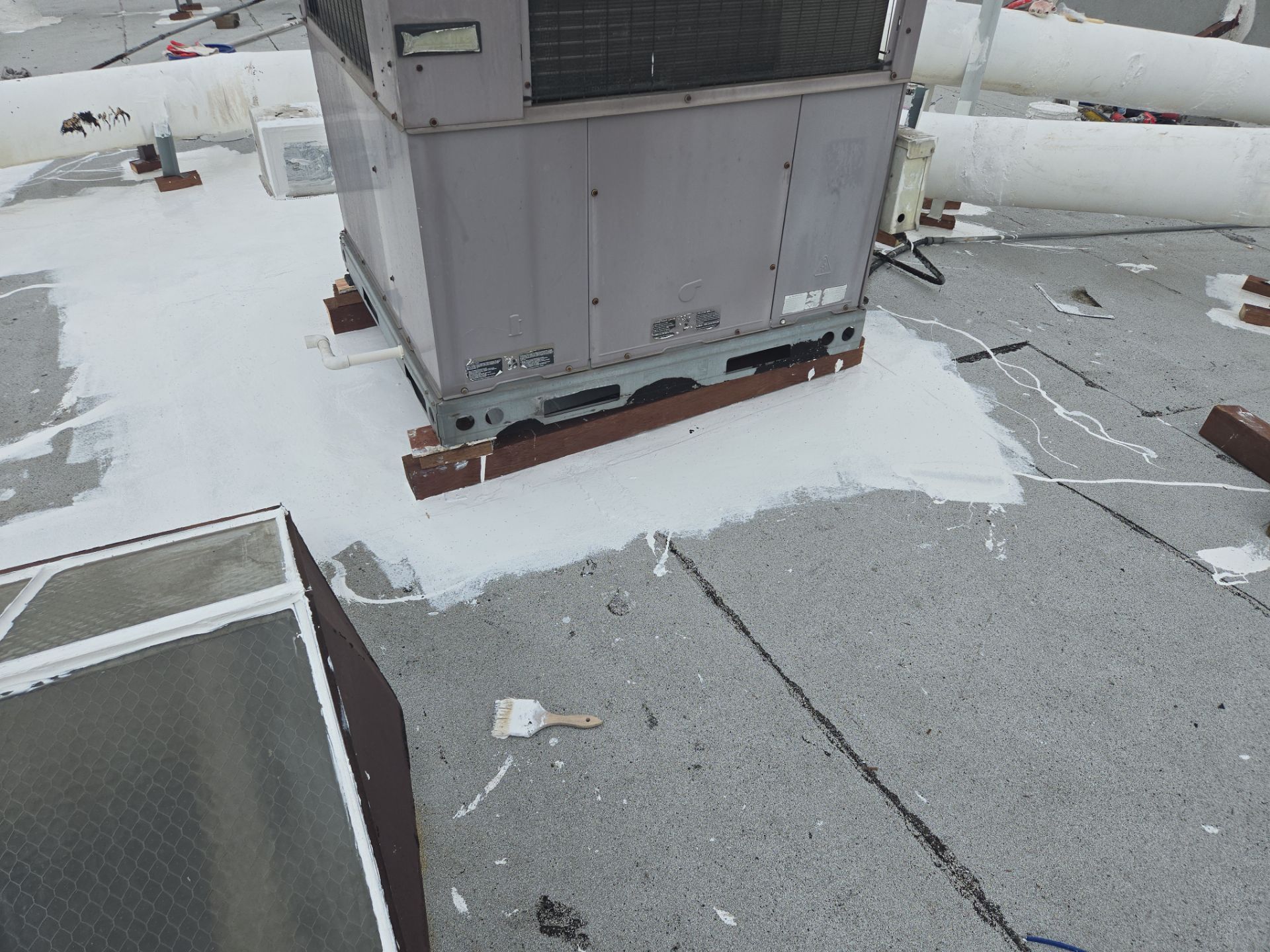 Commercial Roofing Installation using ASC Silicone Membrane by Hull Brothers Roofing