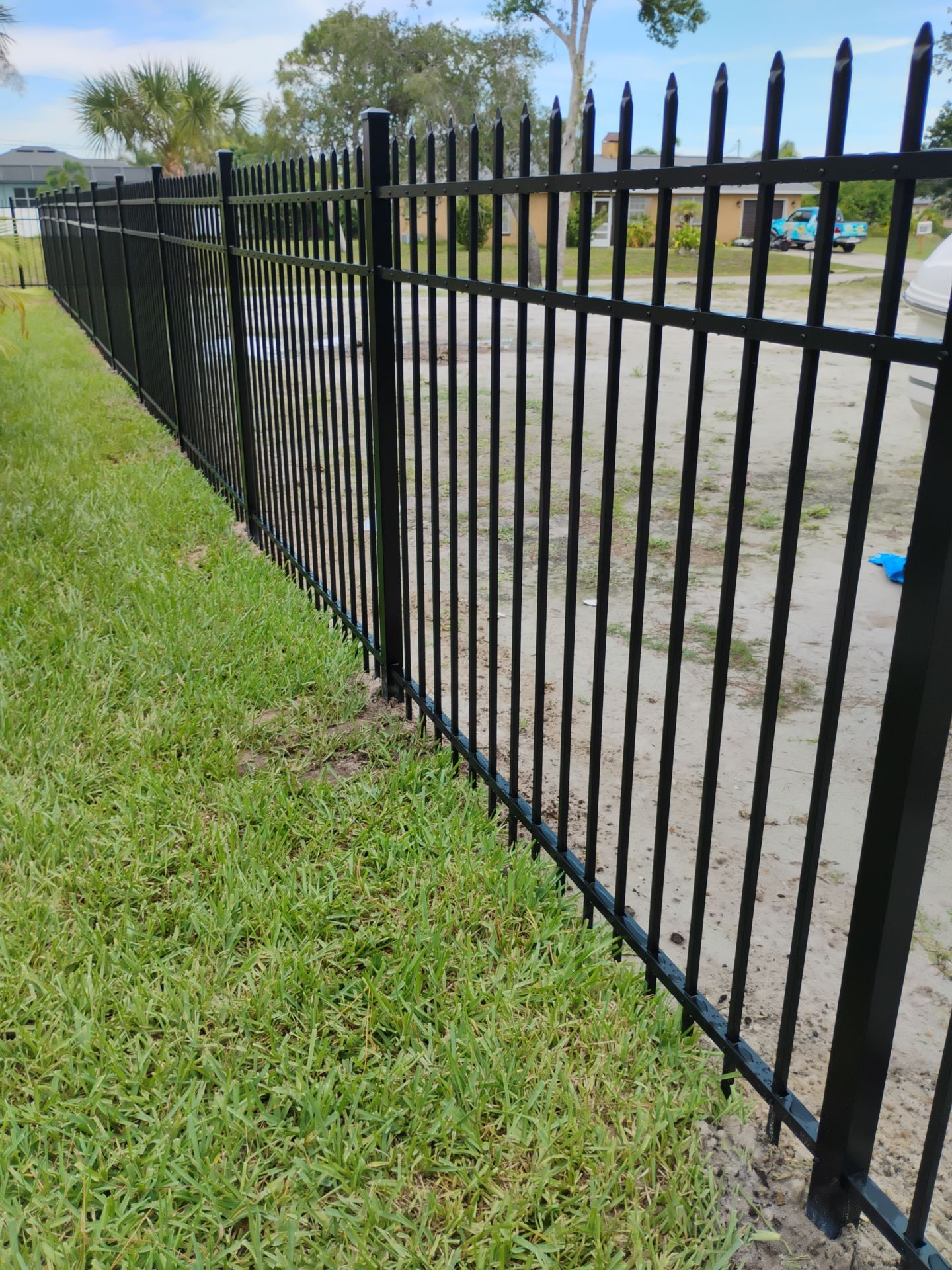 Black Aluminum Spear Top Picket Fence Installation in Englewood by True Fence LLC