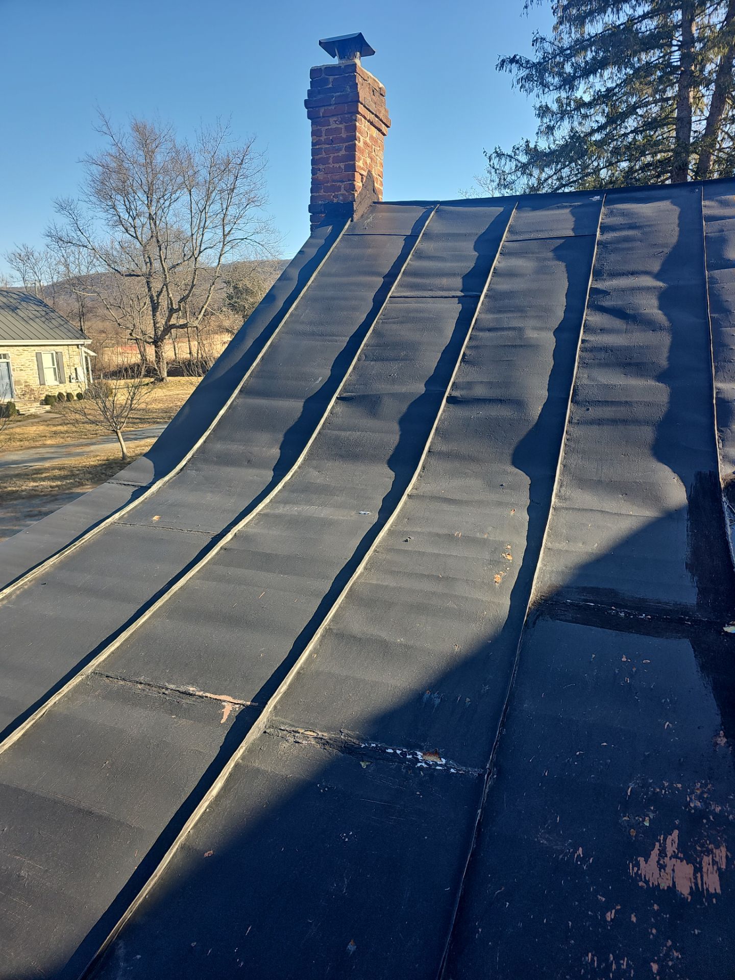 Metal Roof Replacement by Winchester Roofing