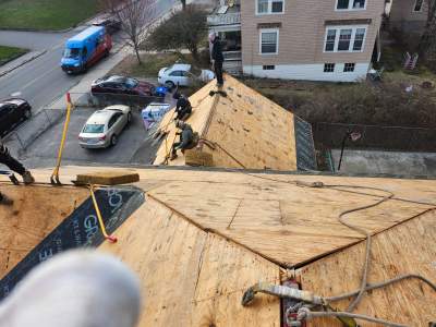 Full Roof Replacement + Seamless Gutters 