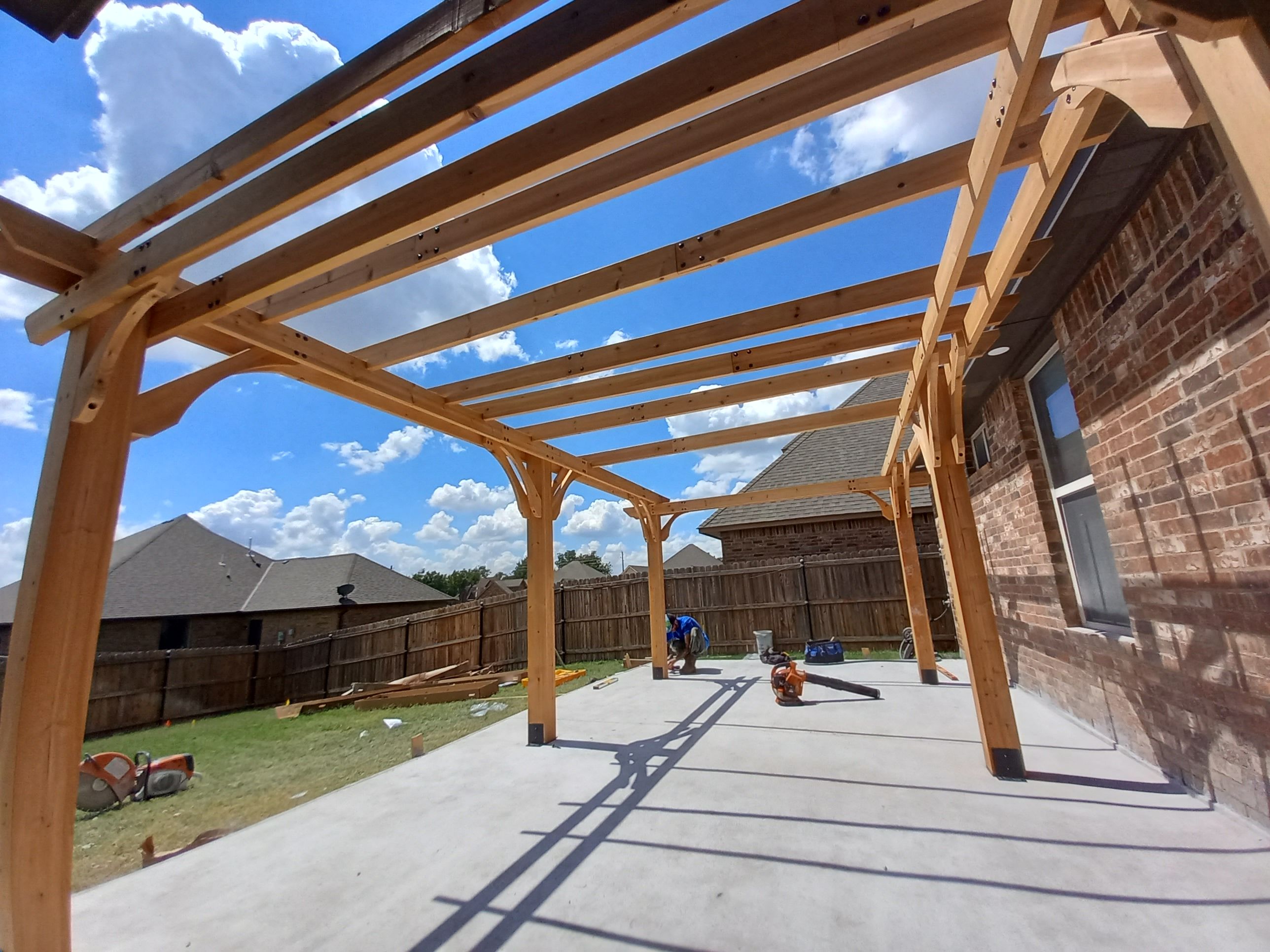 Concrete slab with Pergola by Clays Services Inc
