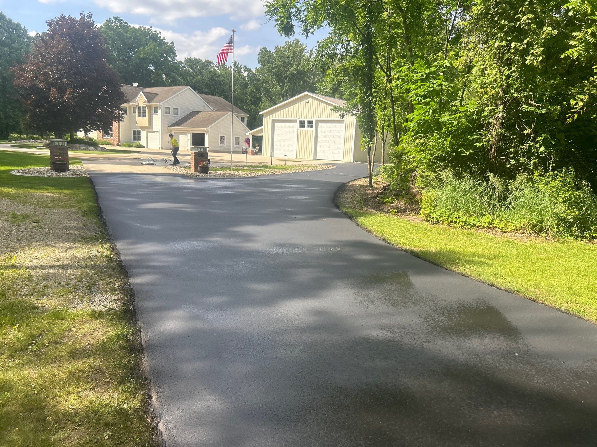 High end residential driveway by Quality Asphalt & Maintenance LLC
