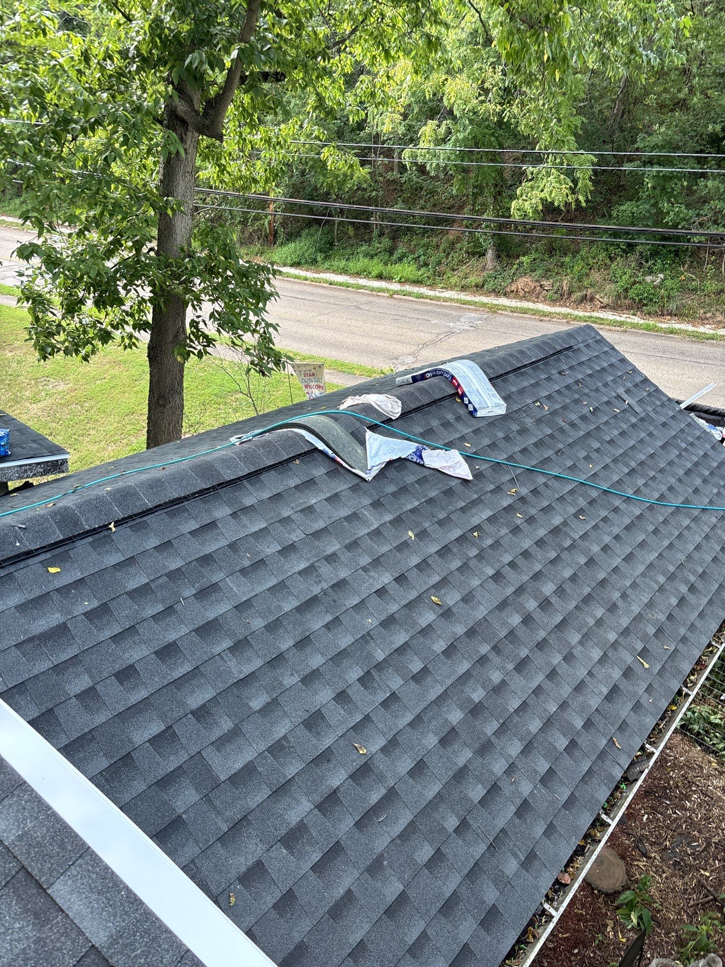 Residential Roofing Installation using GAF Timberline HDZ Charcoal by Rainstoppers Roofing