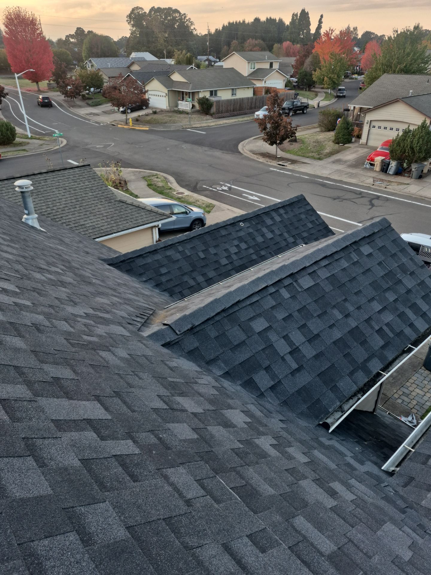 Granite Black Residential Roof Replacement by Orezona Building & Roofing Company, Inc.