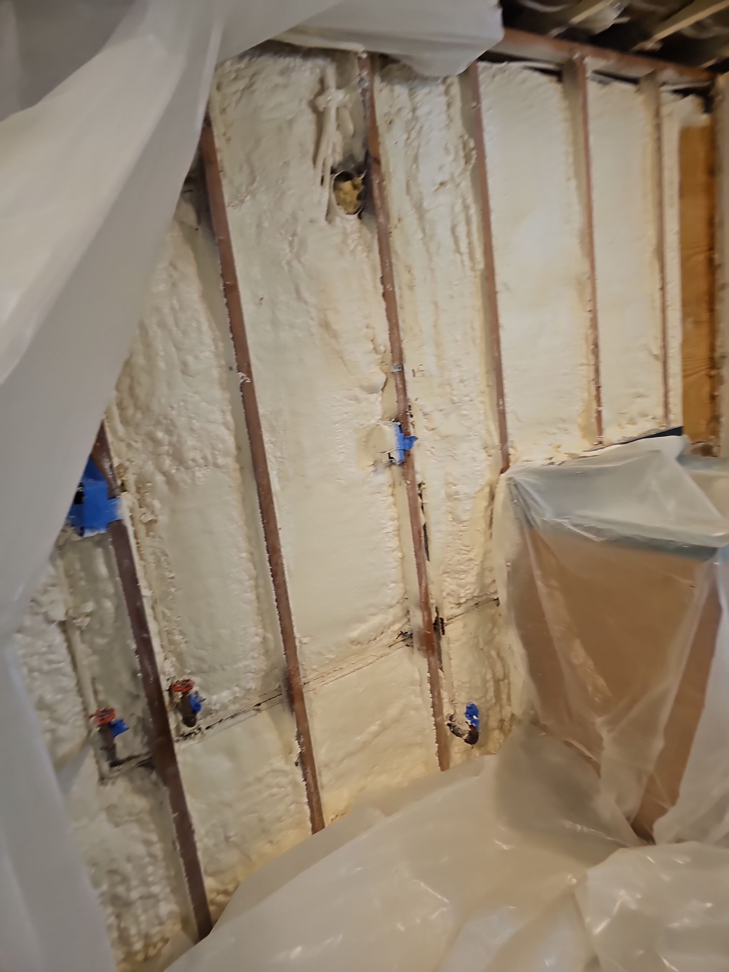 Basement Exterior Walls using Closed Cell Spray Foam by NYS Foam & Energy