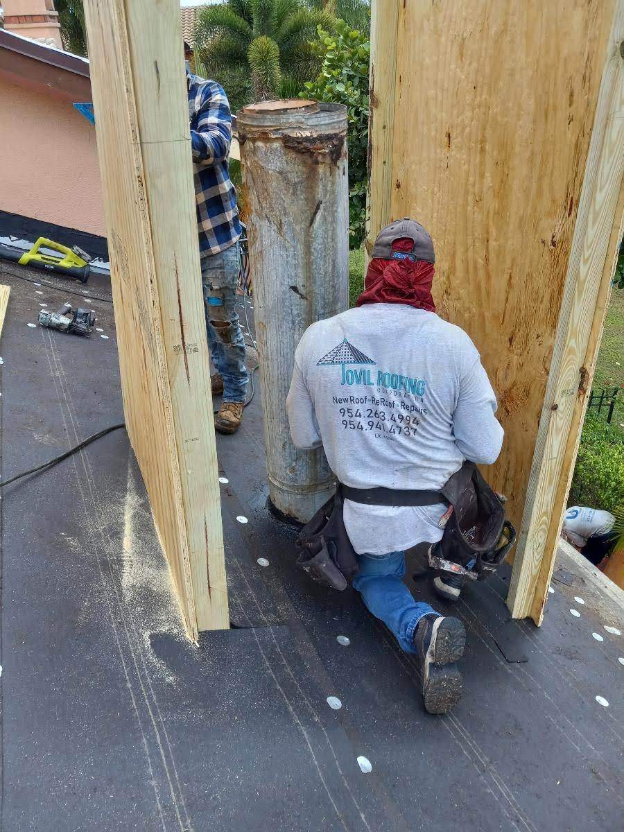 Complete Chimney Rebuild + Tile & Flat Re-Roof  by Morton Roofing, Inc.