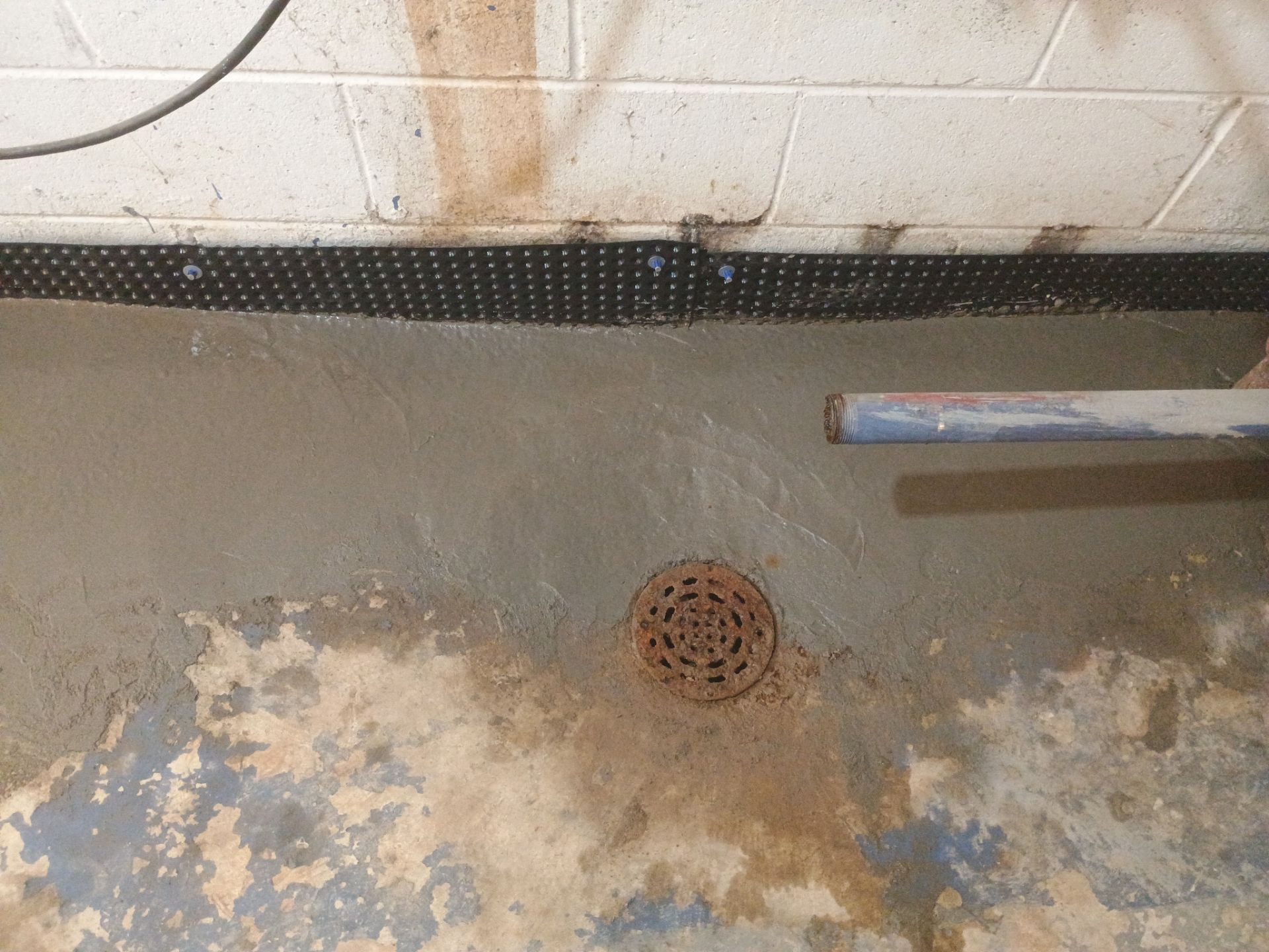 Interior Drain Tile Installation in Columbia Heights, MN by Waterproofing Northeast