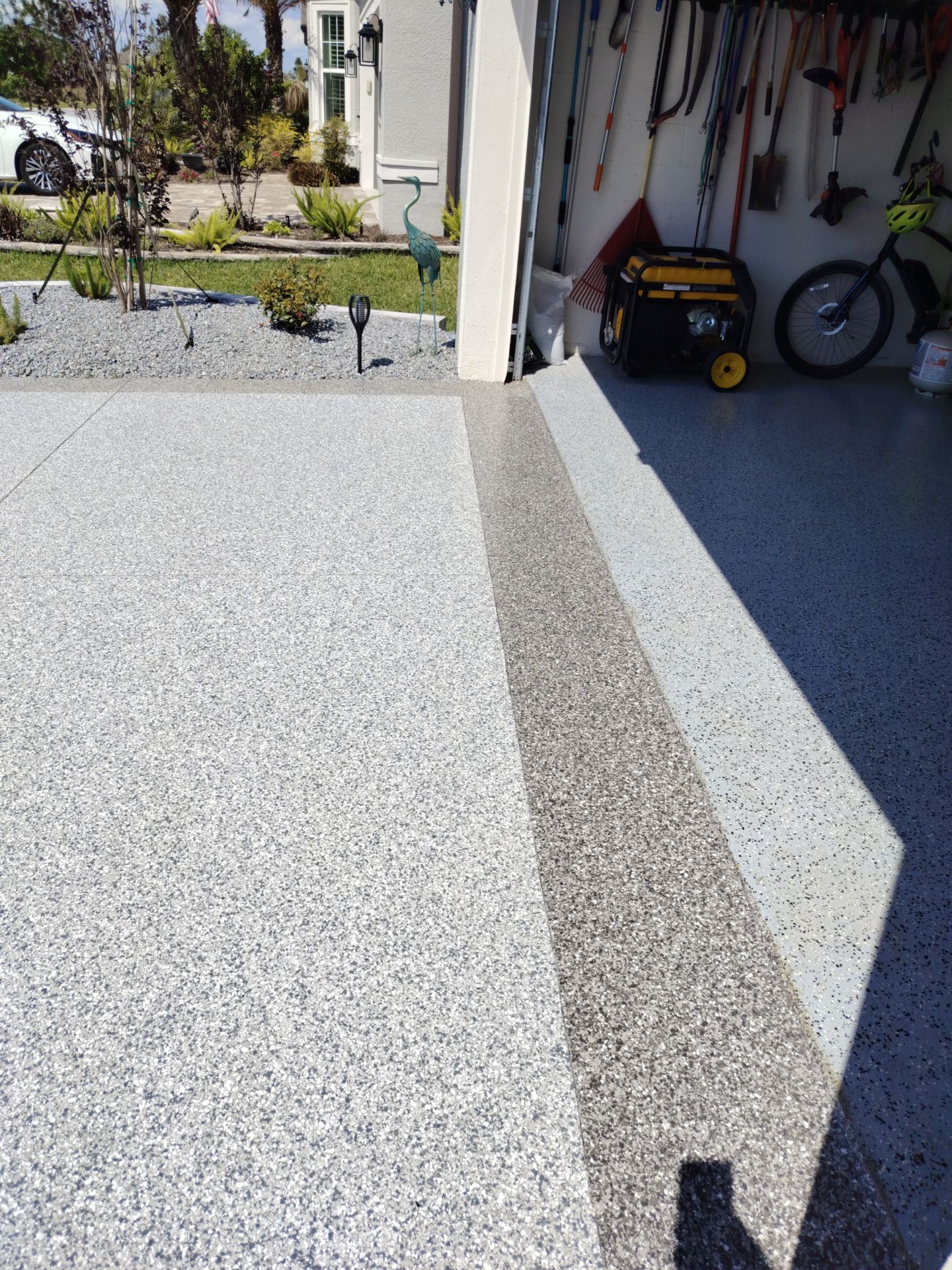 Driveway and Sidewalk in Slatestone with Silvercreek Border by Innovative Concrete Coatings 