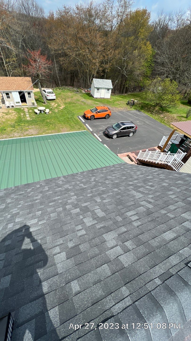 Estate Gray Shingles by Reimagine Roofing