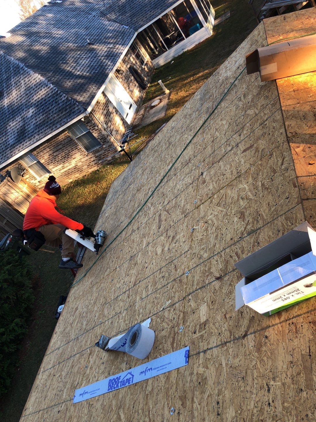 Residential Roofing Installation using Roof Replacement by American Roofing & Construction LLC