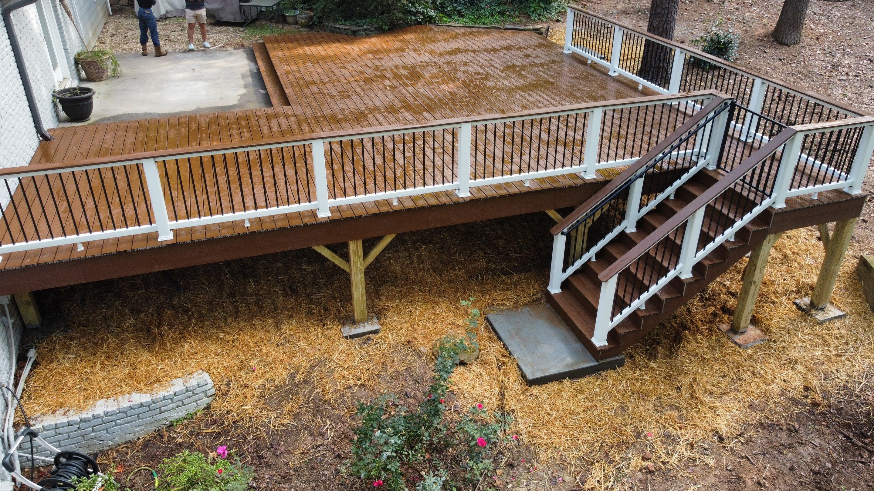 Custom Stained Wood Deck Installation with White Railings in Atlanta by Swift Home Renovations