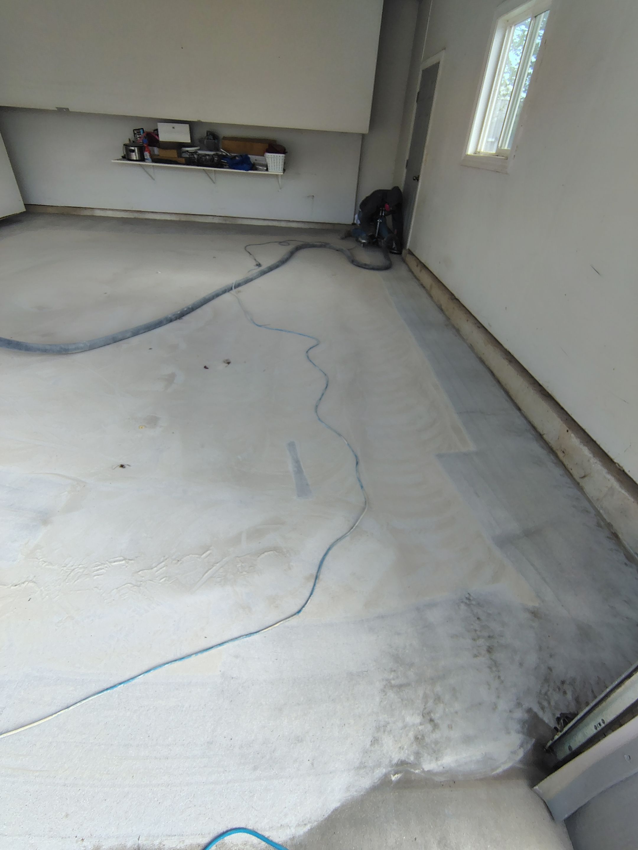 Decorative Chip Epoxy Garage Floor Coating in Sioux Falls by Select Painting, Coatings & Garage Cabinets