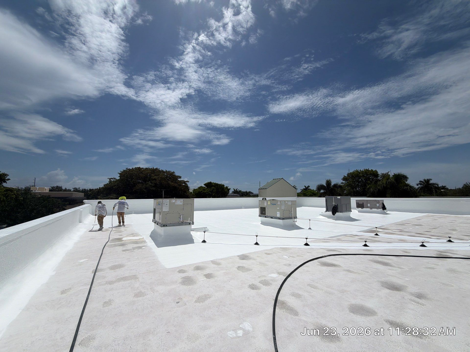Commercial Flat Roof Restoration and Elastomeric Waterproofing in Delray Beach by Roof King LLC