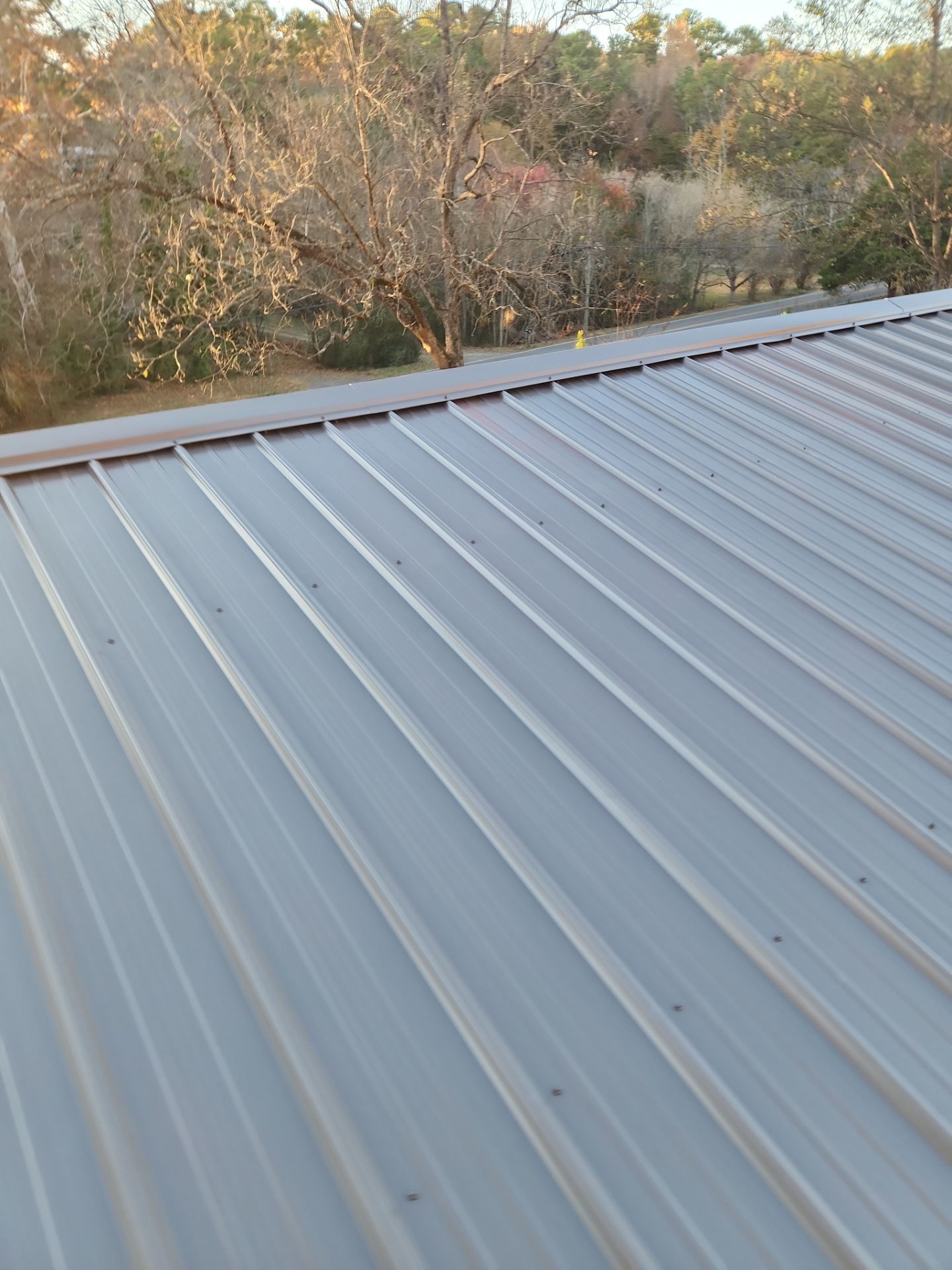 Roof Replacement in Pinson (Metal Roof) by The Roofing Dudes