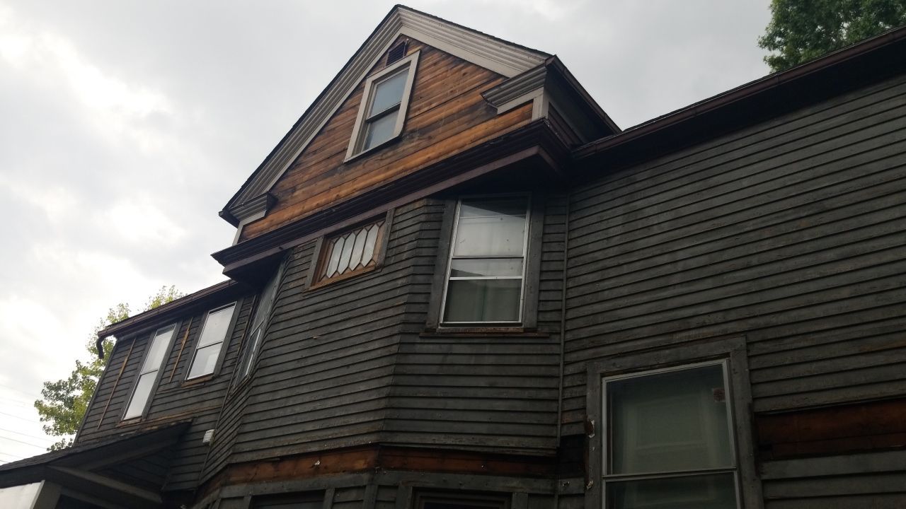 James Hardie Siding on Antique Home by Absolute Roofing and Construction