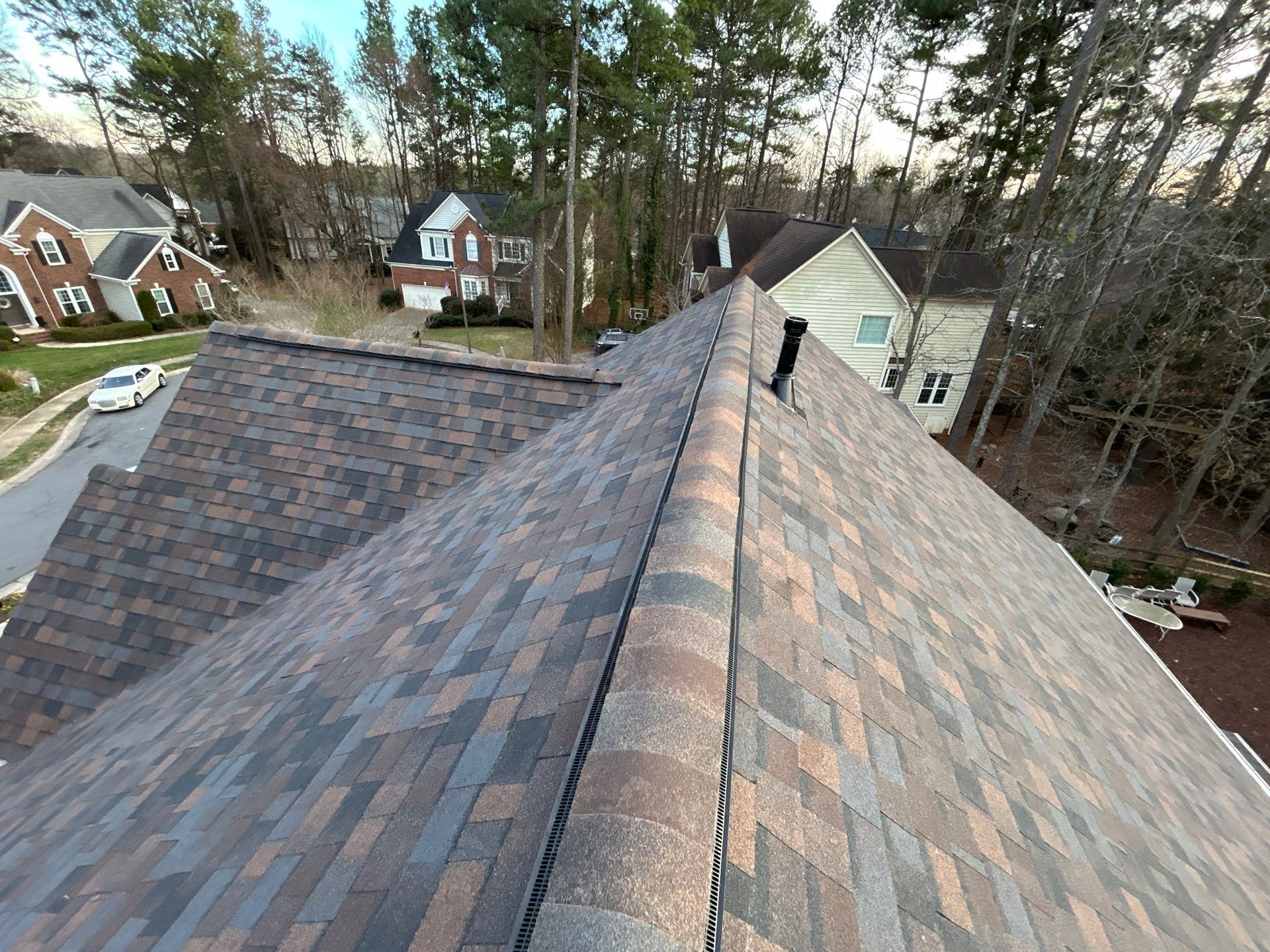 Owens Corning Duration Shingle Roof Replacement and Velux Skylight Installation in Charlotte by Merritt Roofing LLC