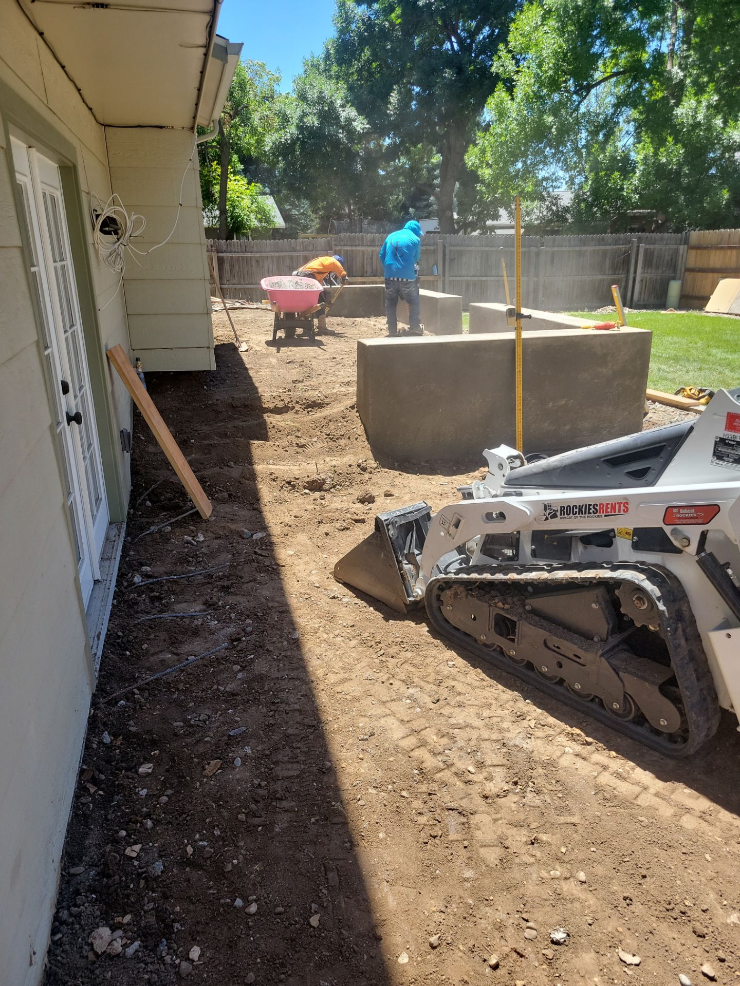 New Concrete Patio and Integrated Retaining Walls in Fort Collins by Center Line Concrete
