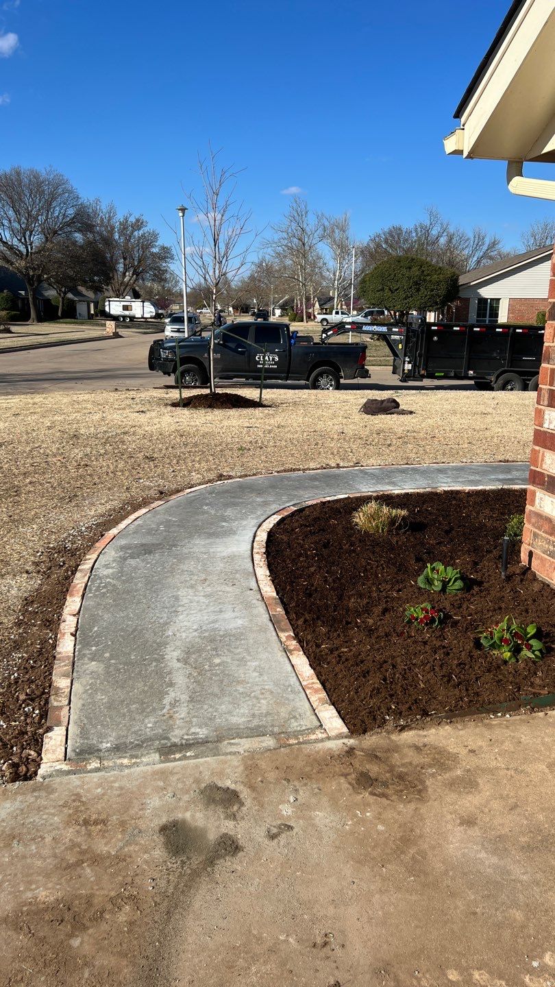 Concrete sidewalk using Concrete by Clays Services Inc