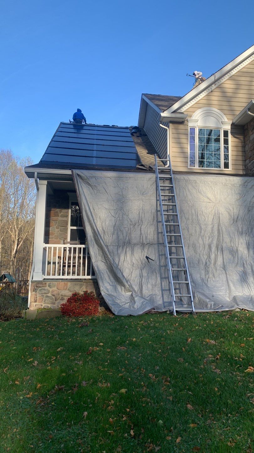 Tesla Solar Roof Replacement by American Home Contractors