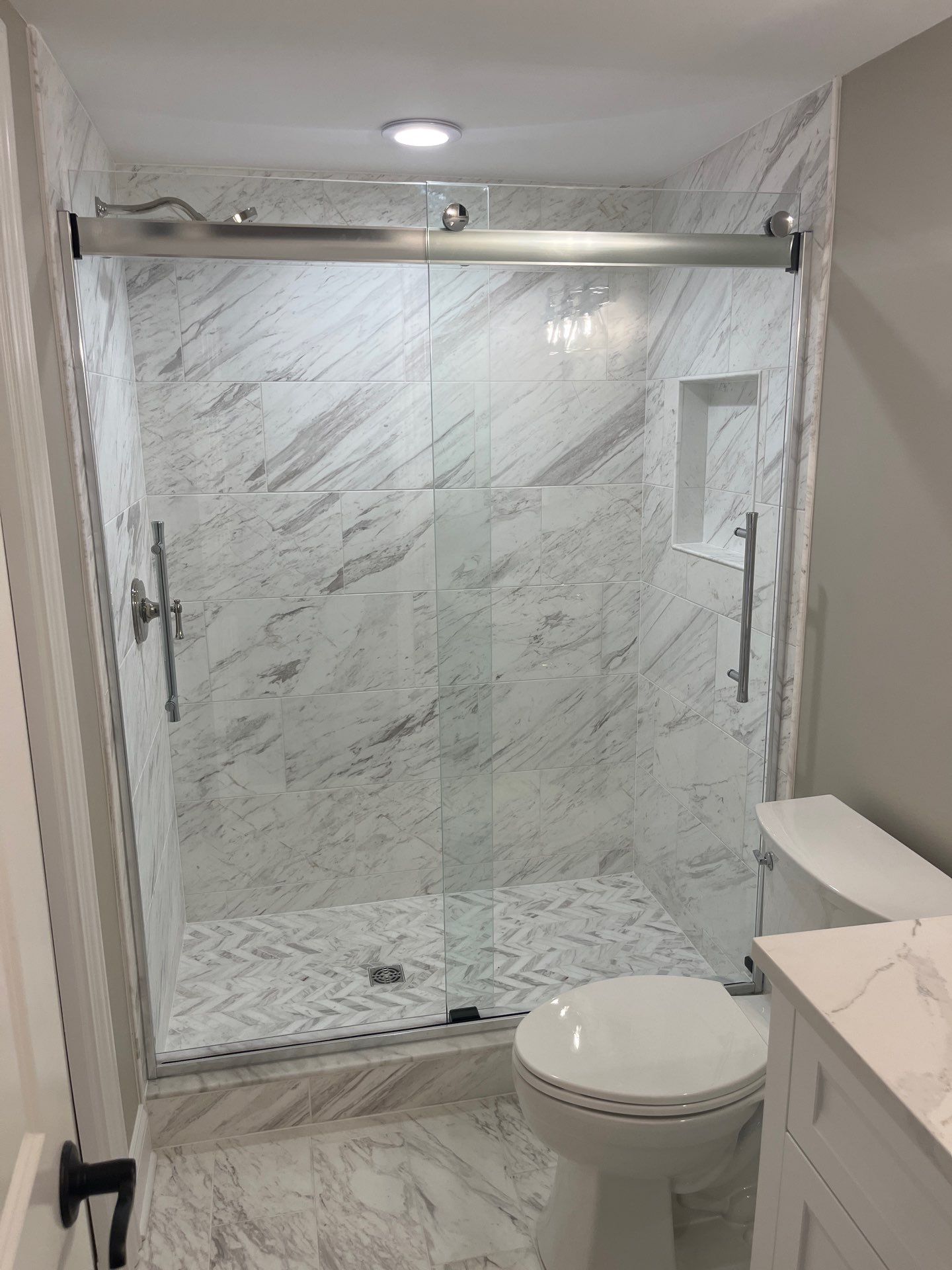 A Tan Bath Gets A Marble Makeover! by Snap Home Solutions
