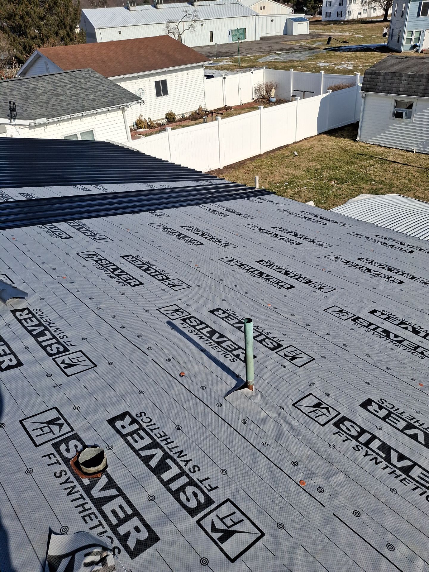 Residential Roofing Installation using Metal by Rainstoppers Roofing
