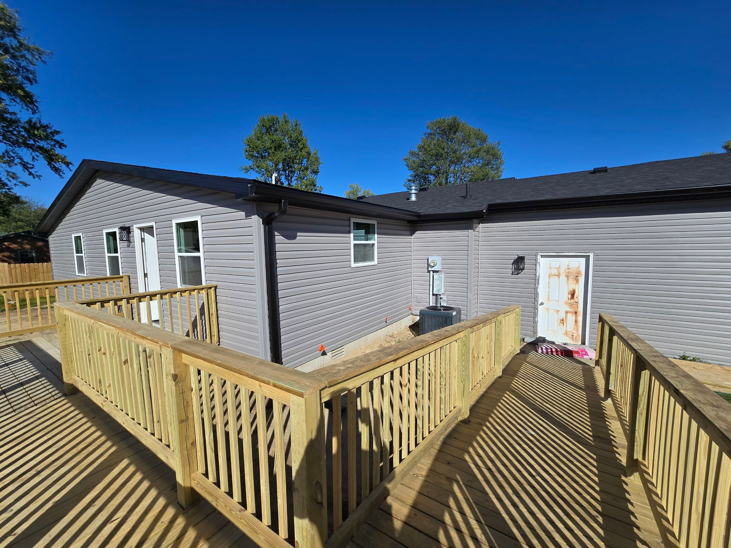 Major Addition using Vinyl Siding by Leach and Brown Construction LLC