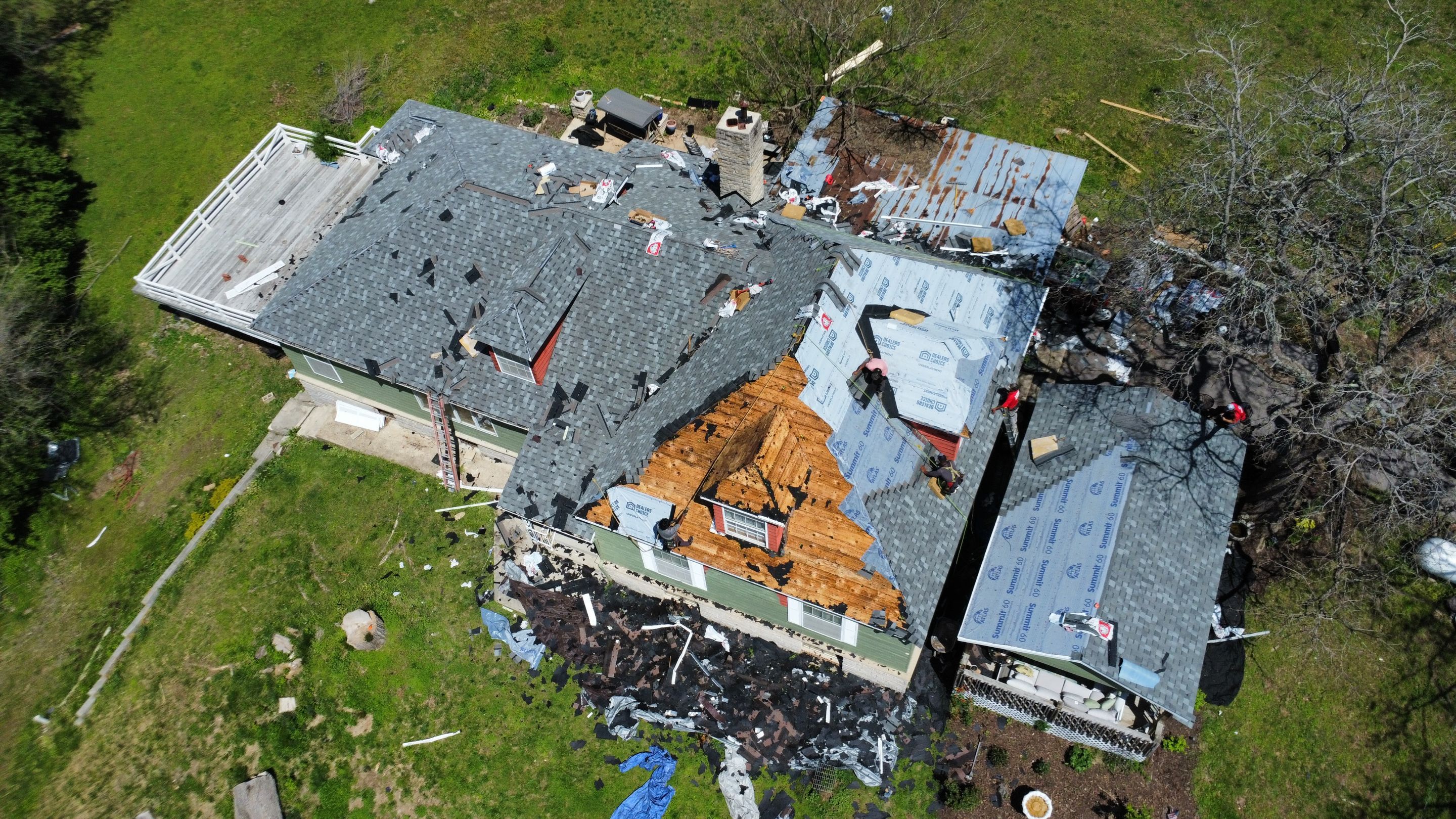 Residential Roof + Gutters & Downspouts Install  by Titan Commercial & Residential Roofing 