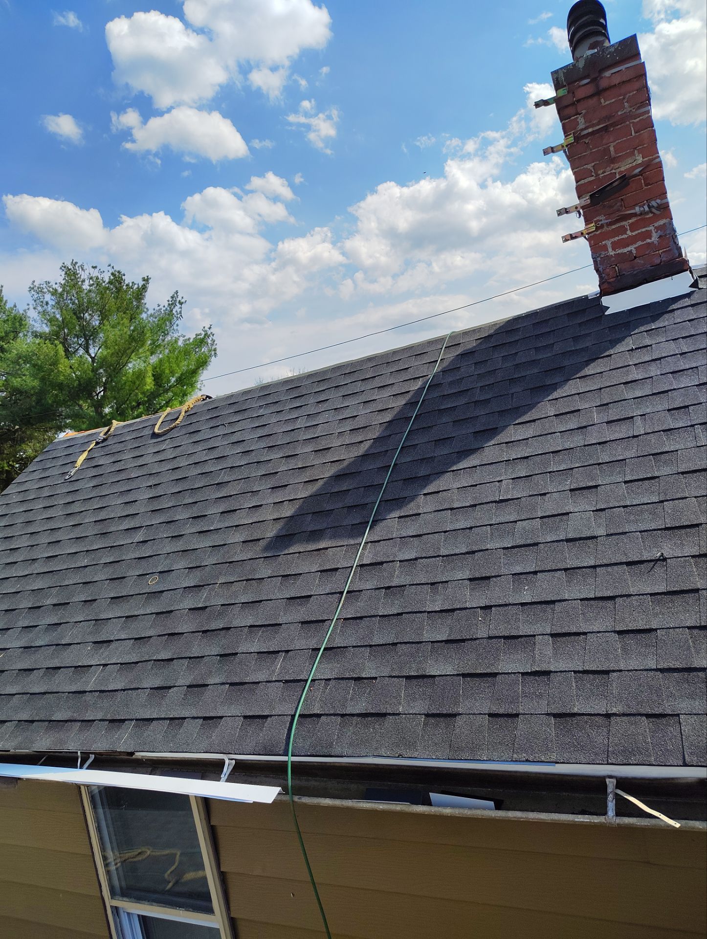 Residential Roofing Installation using GAF Timberline HDZ Charcoal by Rainstoppers Roofing
