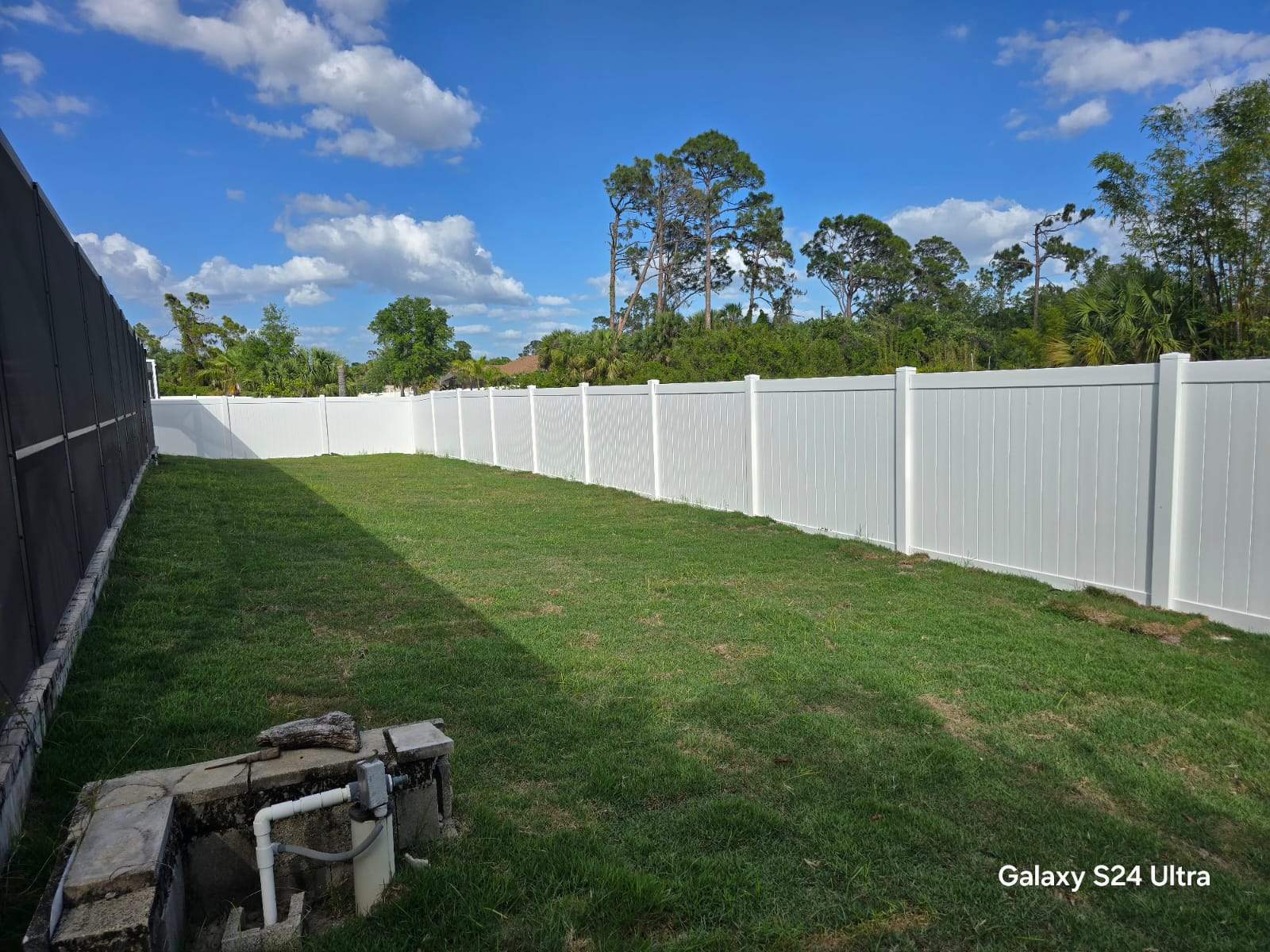 Residential White Vinyl Privacy Fence Installation in North Port by True Fence LLC