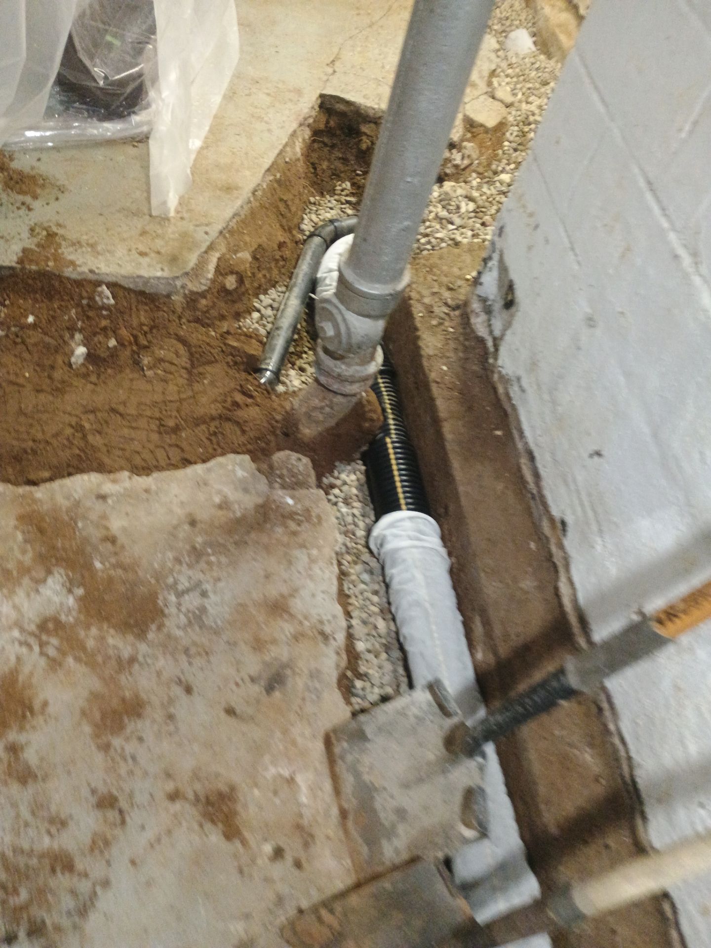 Interior Drain Tile & Yard French Drain in St. Paul, MN by Waterproofing Northeast