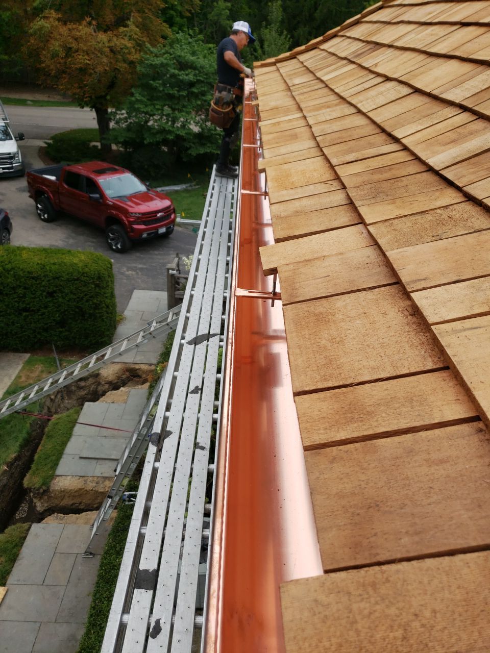 Cedar Shake Roof Replacement with Half Round Copper Gutter Installation  by Custom Installations, Inc.