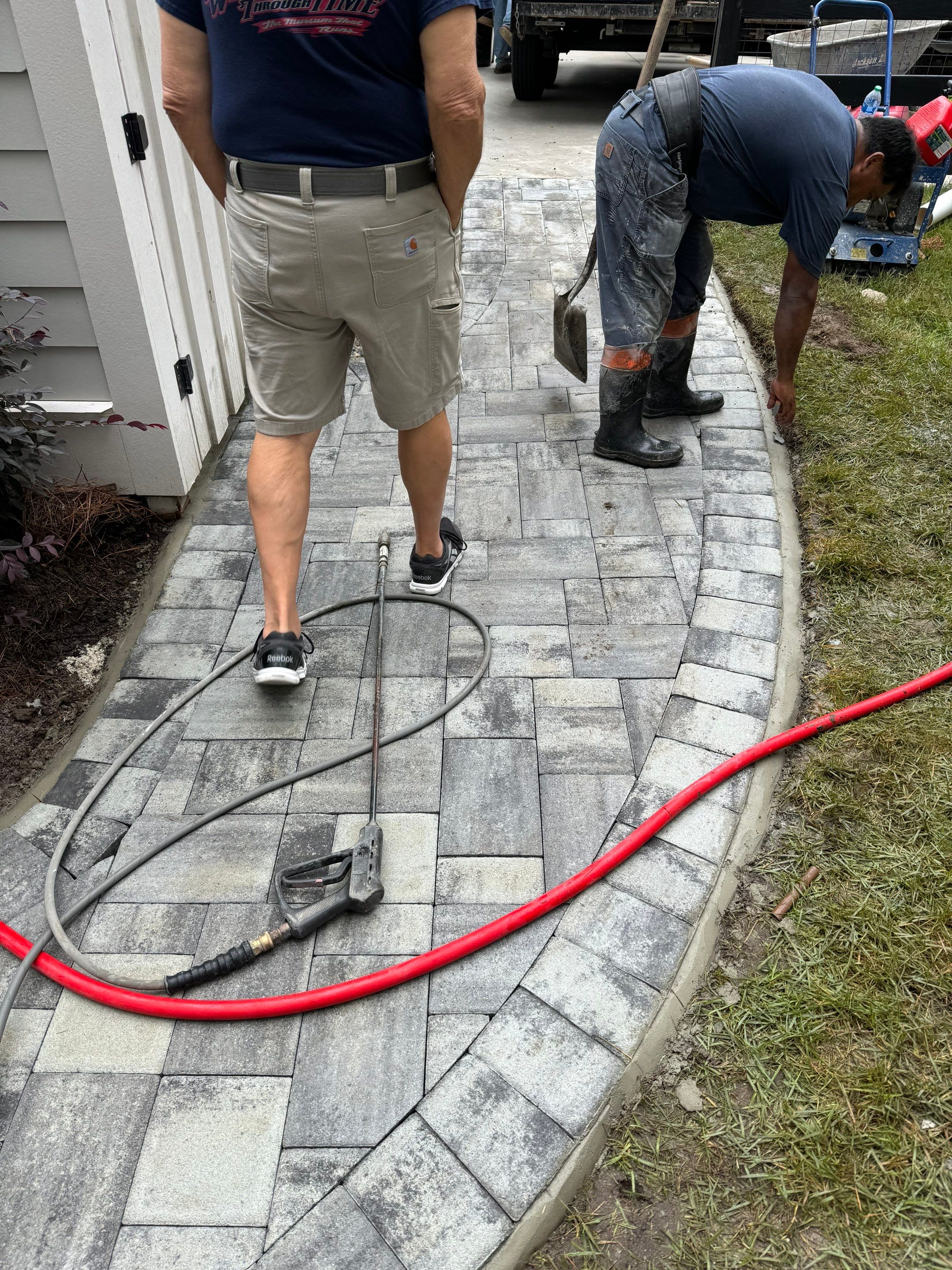 Curved Gray Paver Walkway Installation in Bluffton by Lowcountry Scapes, LLC