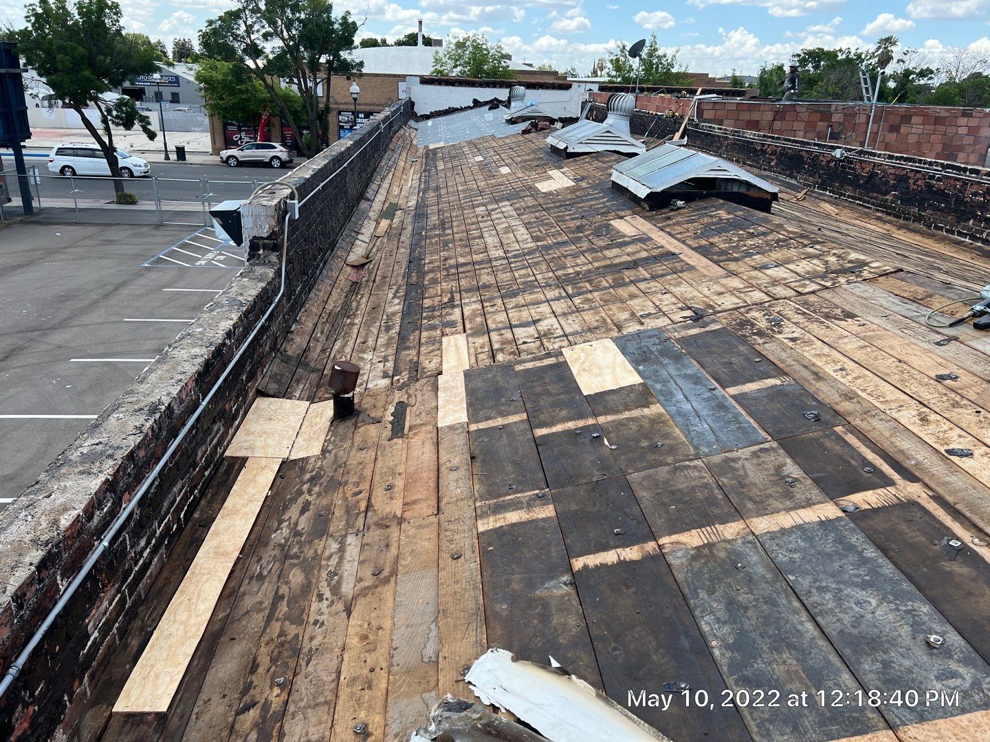 Commercial Roofing Installation using Conklin BenchPly system with PUMA top coat (imbedded fabric system) by Straight Edge Roofing Inc
