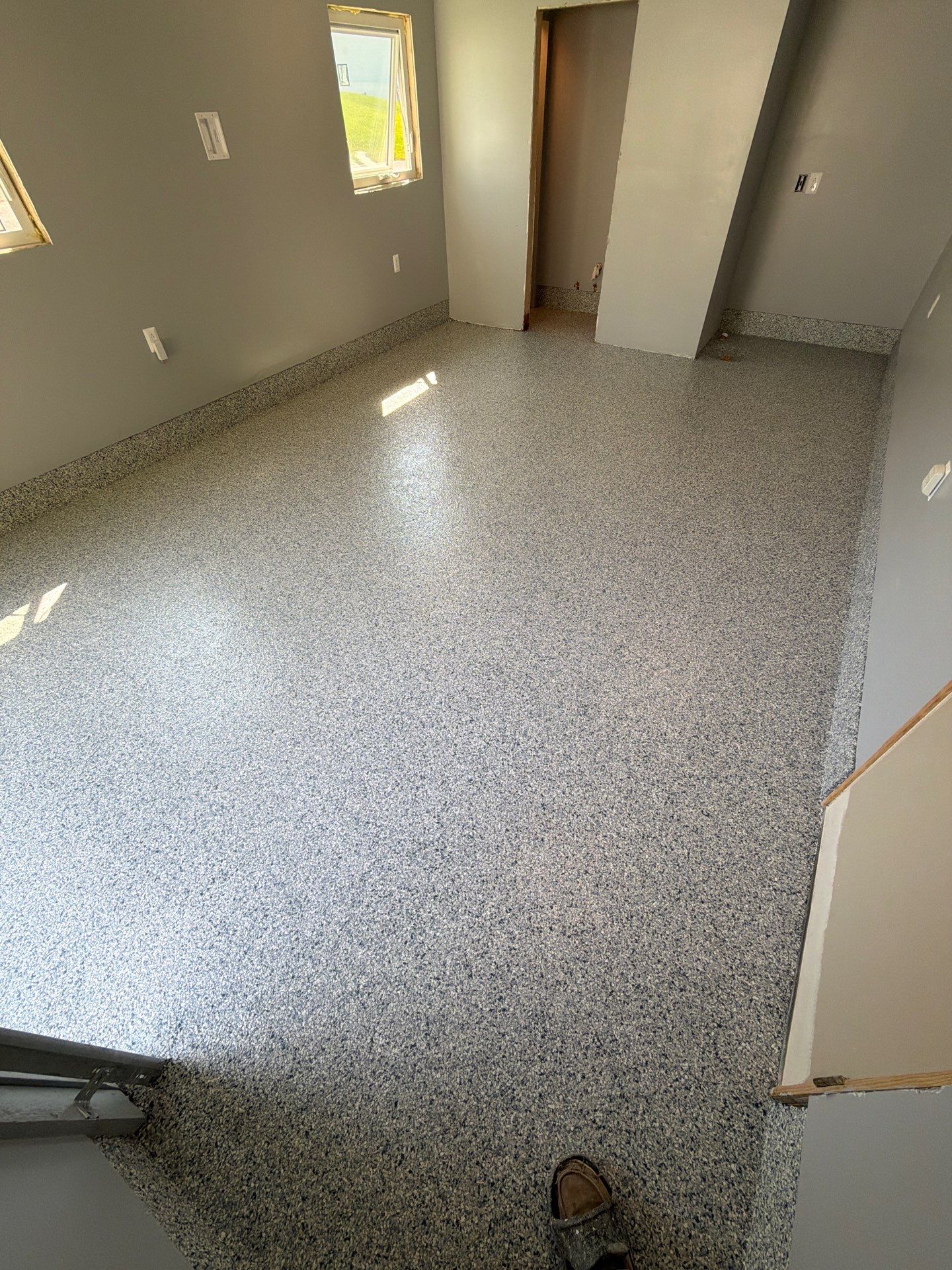 Custom Tidal Wave Epoxy Flake Floor Installation in Mears by Gordon Painting