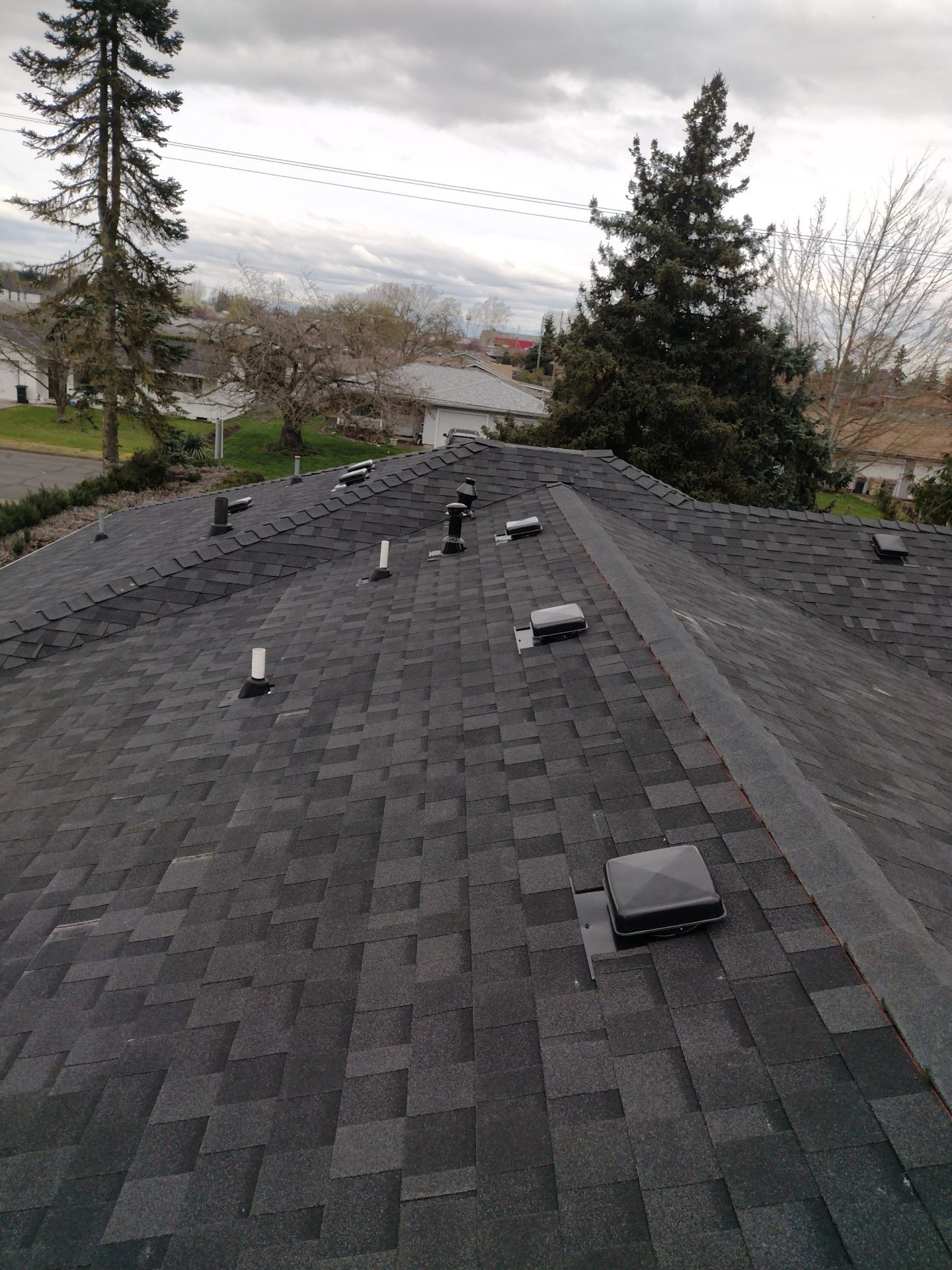 Residential Roofing Installation using IKO Dynasty (Color: Granite Black) by Orezona Building & Roofing Company, Inc.