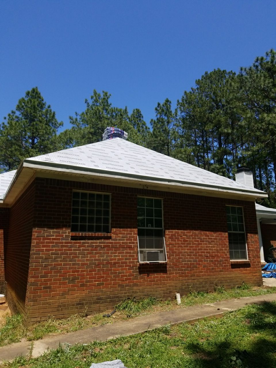 Residential Roofing Installation using Roof Replacement by American Roofing & Construction LLC